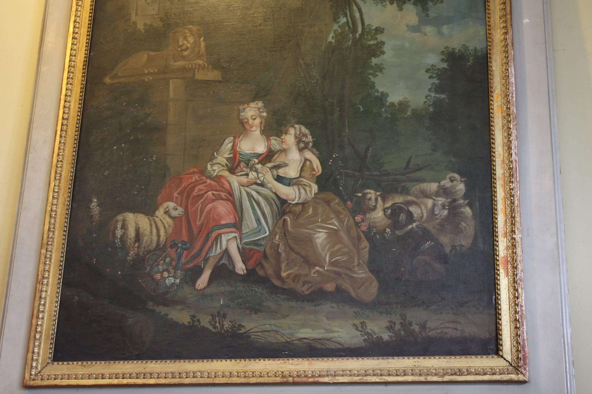 Elegant 18th century French Louis XVI trumeau with finely painted oil on canvas depicting two ladies playing in the field with the sheep. Great size and would make a beautiful statement in any home.