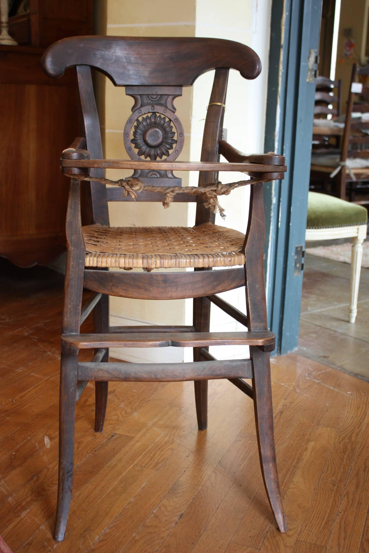 French antique high chair / youth chair with rush seat.