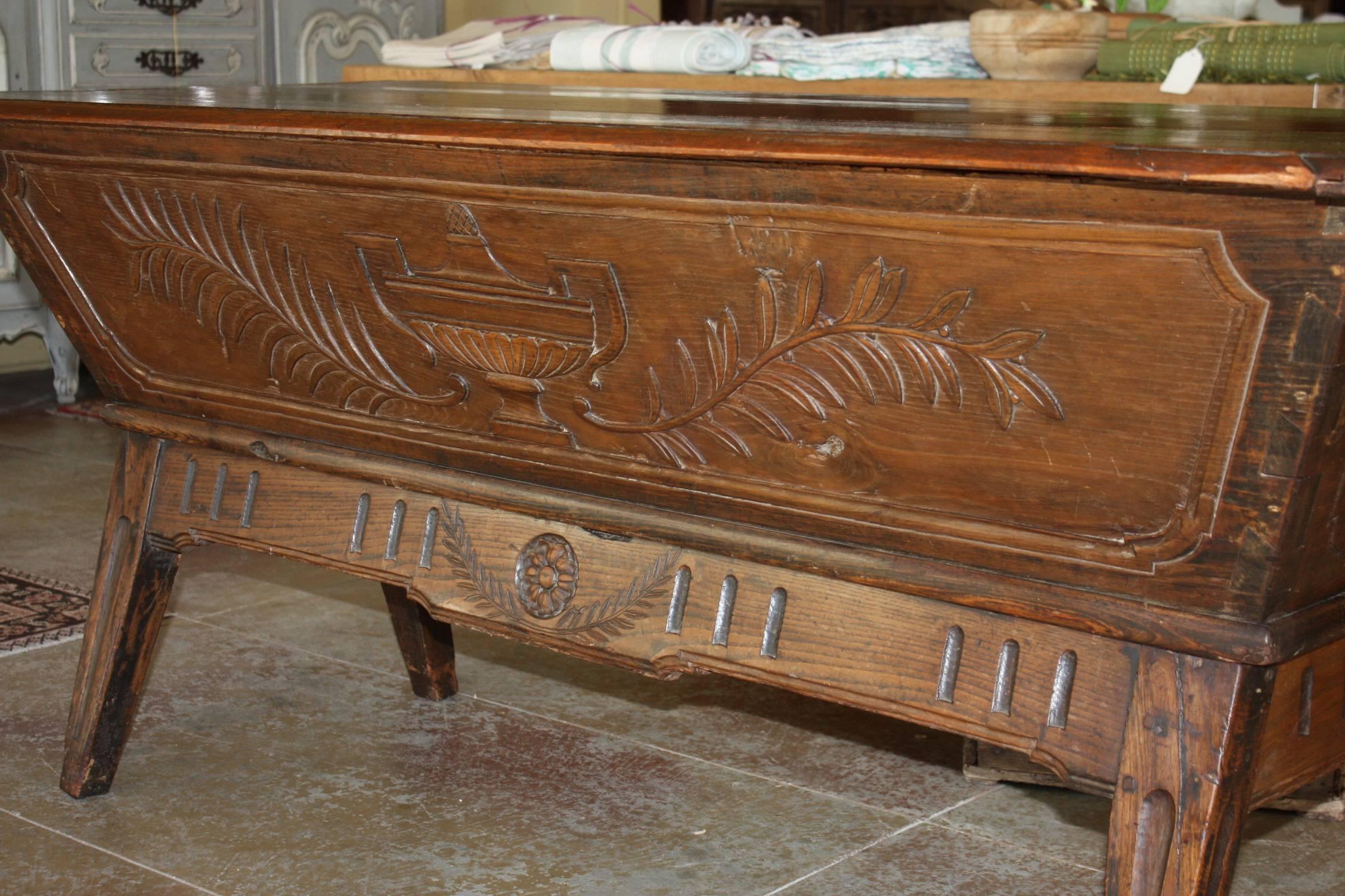 A magnificent French country walnut petrin, or dough bin, from the 19th century. The walnut surface has an incredible patina. Rustic construction with wooden pegs and large, handsome joints. Great size and is functional as well as attractive.