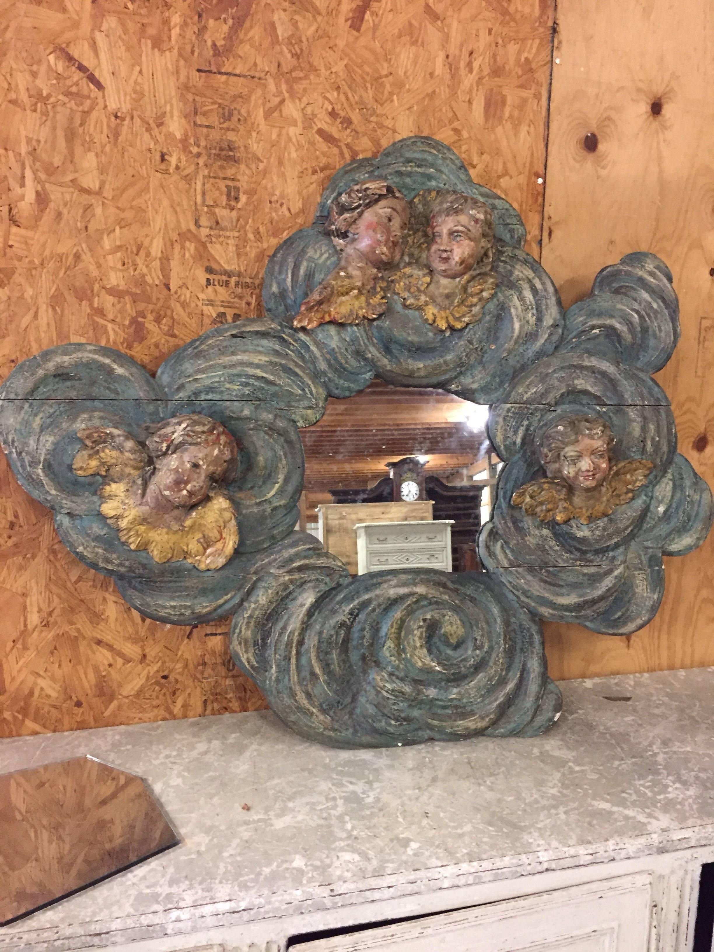 Italian Carved Mirror with Putti and Swirling Cloud Motifs For Sale 4