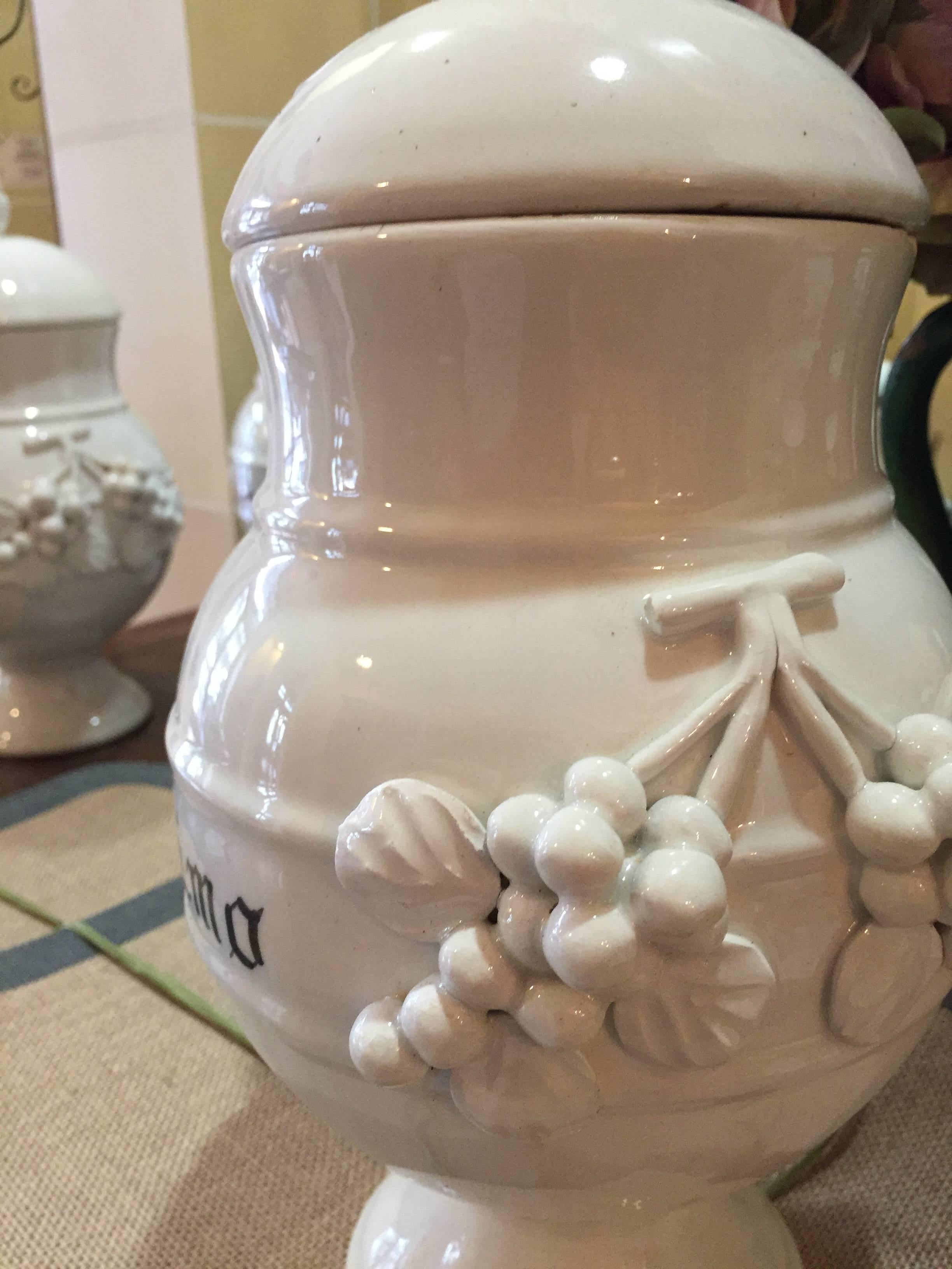 A beautiful hand-painted French apothecary jar. We have several in stock.