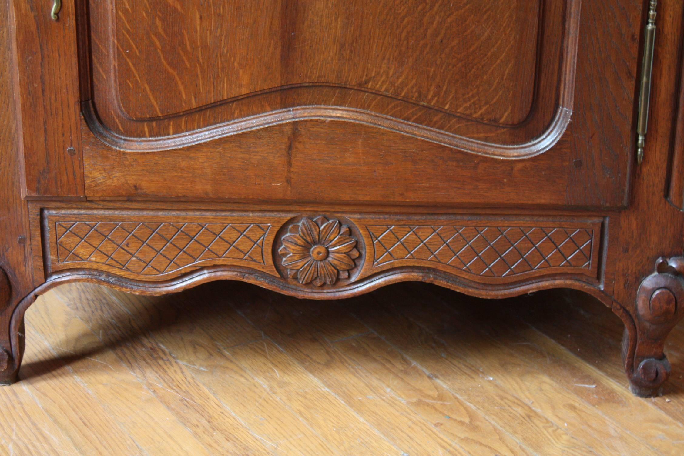 Antique French country Louis XV cabinet de confiture ‘jam holder’. Single drawer solid oak with iron hardware and a beautiful carved details.