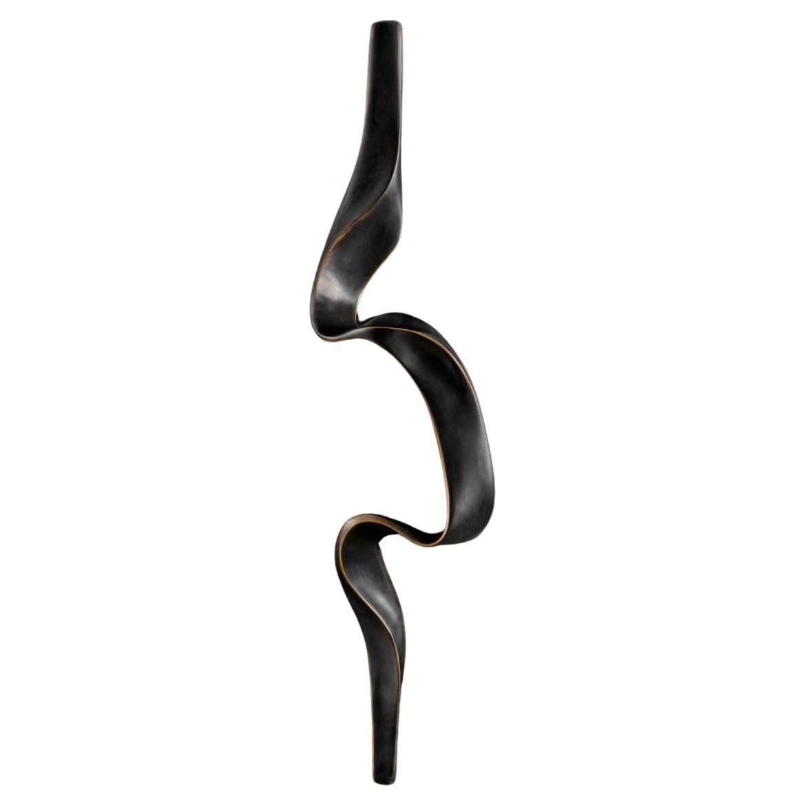 Blackbuck Handle A in Brass, Viya by Vikram Goyal

The Blackbuck is an animal revered across cultures, and in India symbolic of purity and the divine. Our collection of cast brass objects manifest some of these traits; the dark graceful twisting