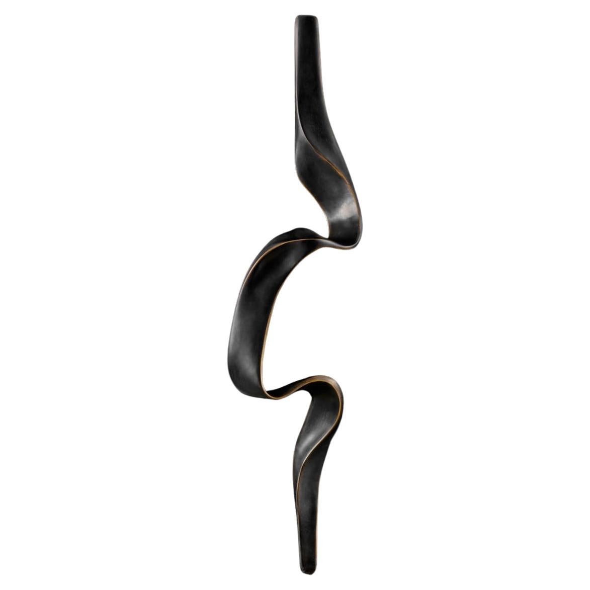 Blackbuck Handle B in Brass, Viya by Vikram Goyal

The Blackbuck is an animal revered across cultures, and in India symbolic of purity and the divine. Our collection of cast brass objects manifest some of these traits; the dark graceful twisting