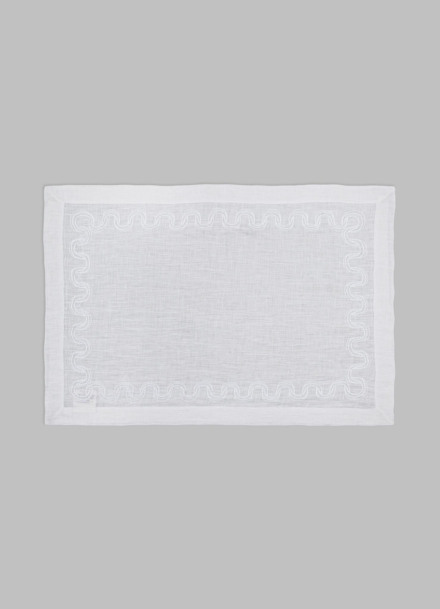 Paigah Hand Embroidered White Linen Placemat - Set of 2, Viya by Vikram Goyal

Hand-embroidered on linen, a refined sophistication defines this collection of white-on-white textiles, where texture, technique, and light highlight the delicacy of