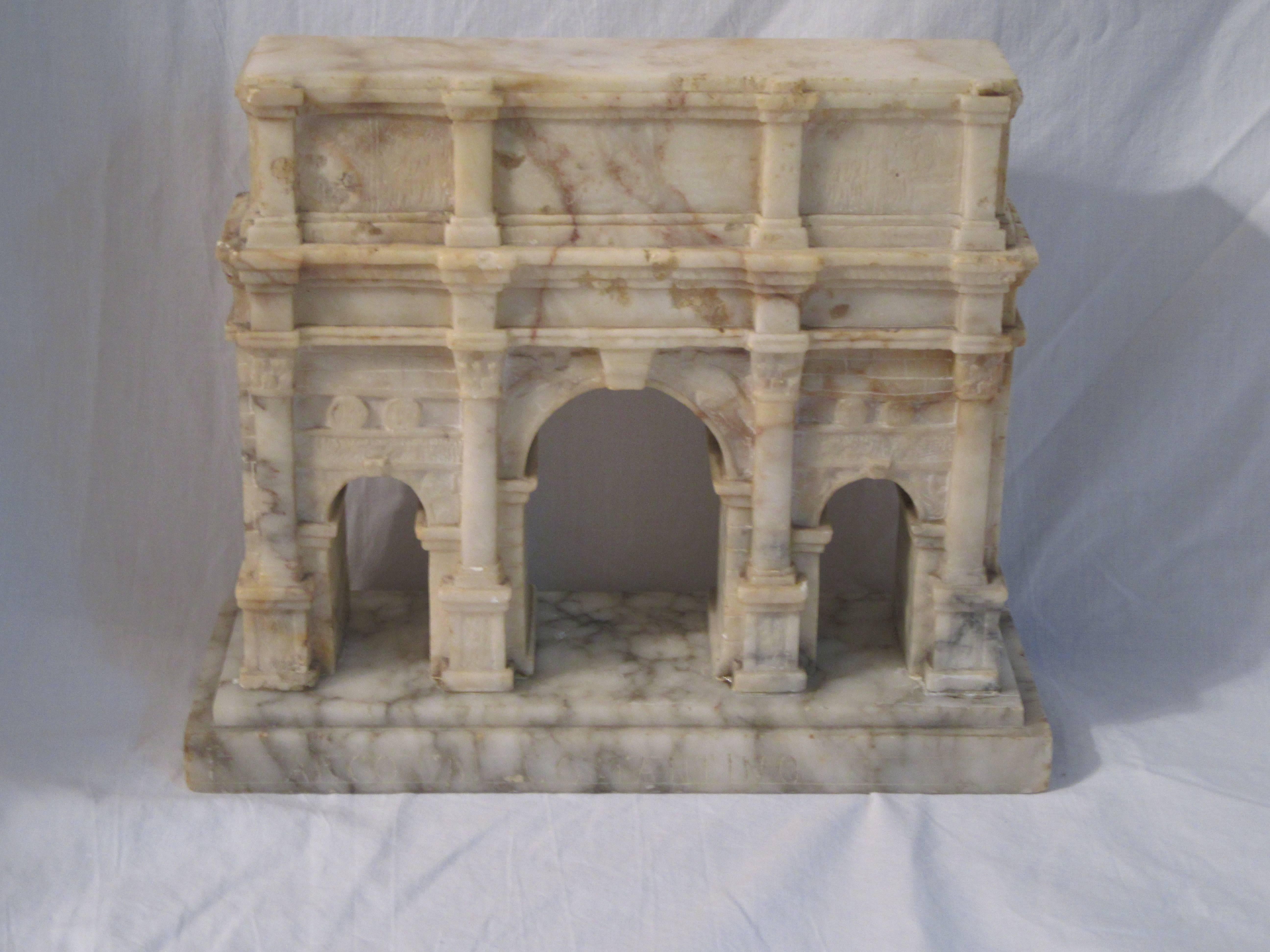 A very fine Grand Tour model the Arch of Constantine in carved alabaster. The model sits on a Carrara marble base which is marked "ARCO DI COSTANTINO".