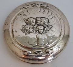 Edwardian Sterling Lidded Glass Vanity Jar of Cherub Design