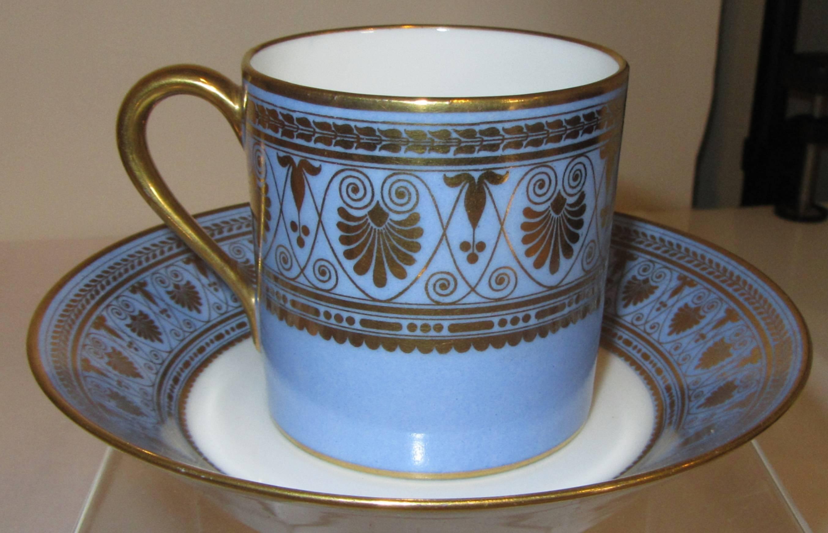 A coffee set in the pattern designed for Louis Phillipe for the castles of Saint-Cloud and Compiègne.
Decorated with rosettes and friezes of palmettes in gold on an agate blue background composed of two cup, two saucers, a sugar bowl, a teapot, and