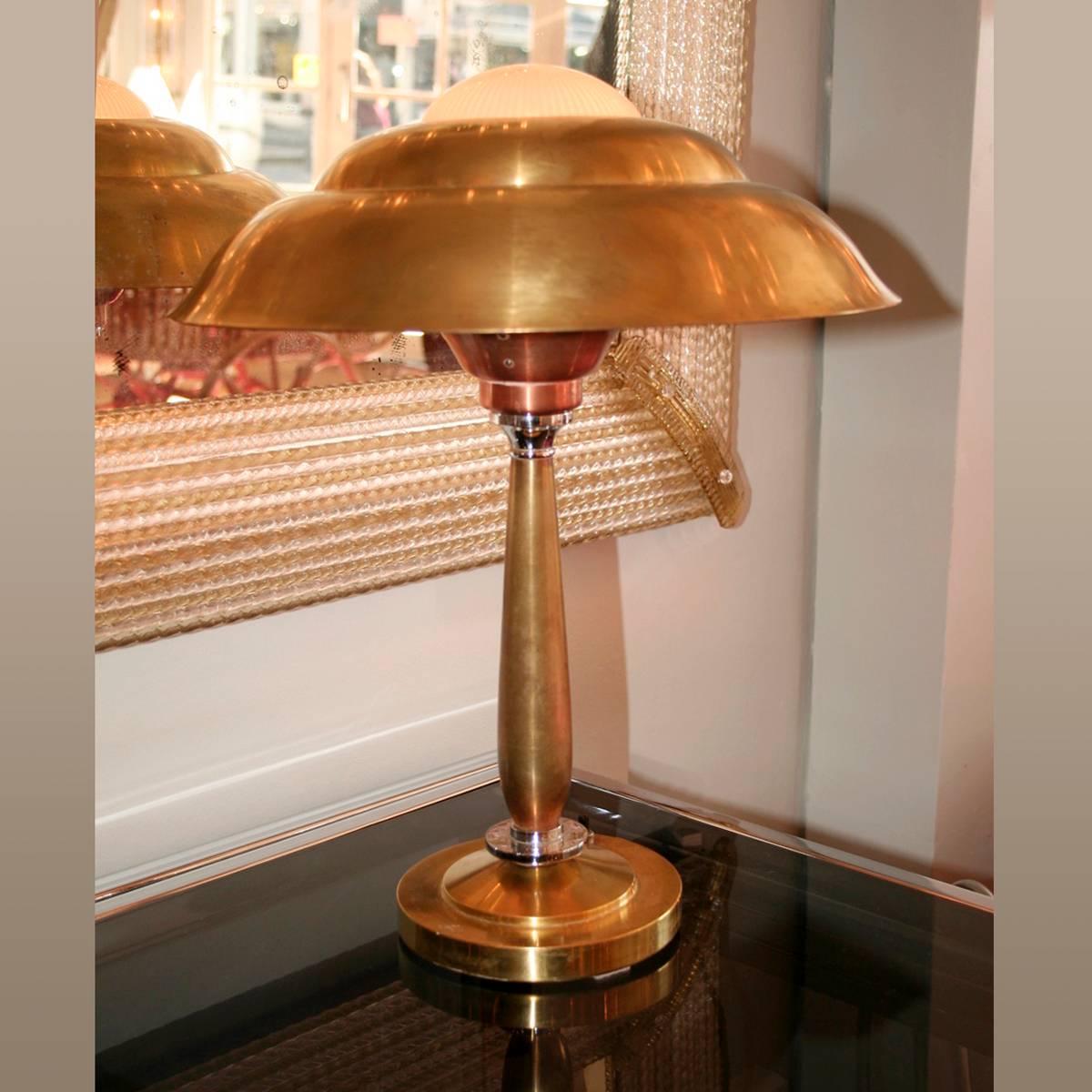 Beautifully-detailed domed lamp. The body and dome are made of brass while there are chrome and copper details on the main support topped by a small ribbed glass dome.