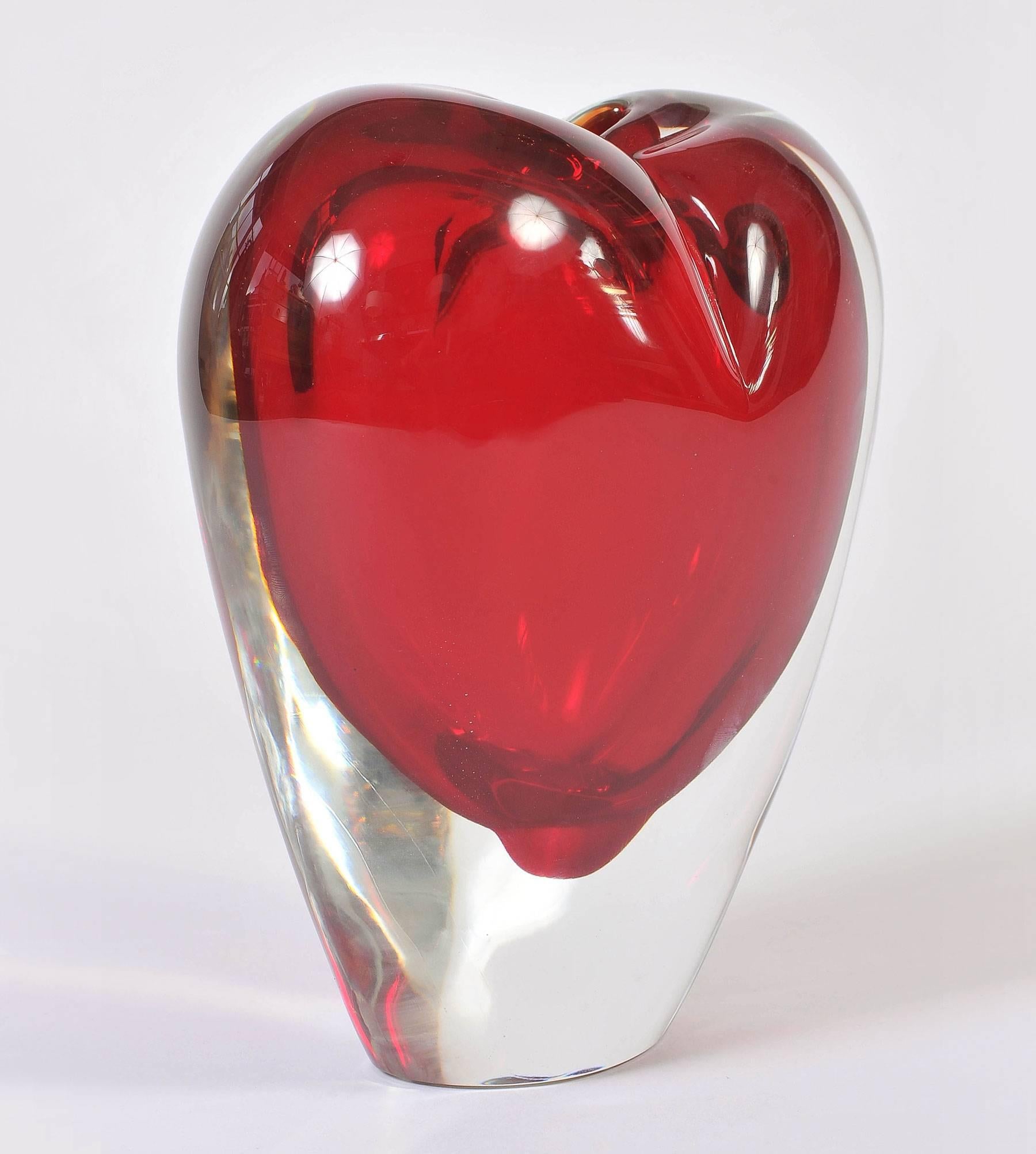 Big-hearted vase in smoothly curved ruby red Murano glass with clear glass surround.
