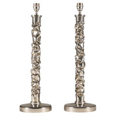 Pair of tall 'melting metal' polished nickel lamps by Porta Romana, 2010