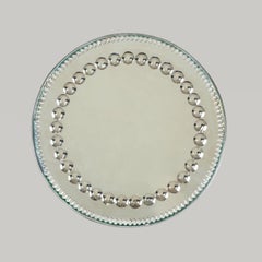 Circular 1900's sorcerers mirror / tray stamped Made in England to back