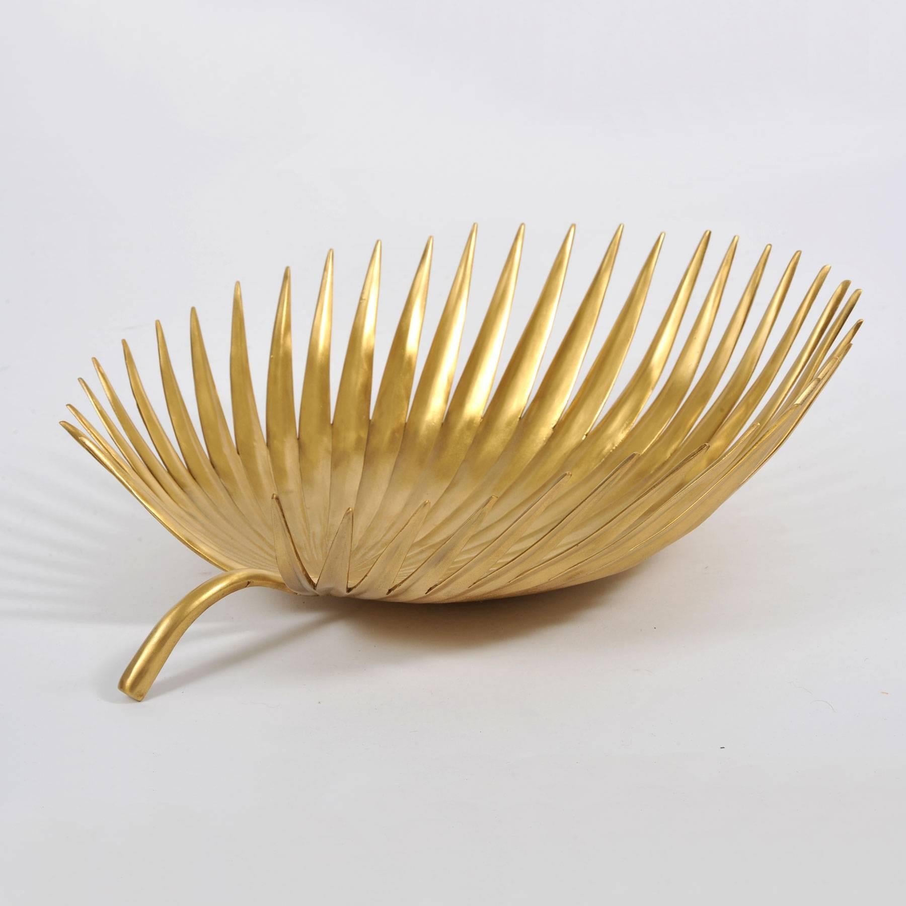 Homage to nature. Handmade cast brass palm leaf bowl. A centrepiece bowl which is substantial and sturdy yet retains the delicate soft feel of nature's design.