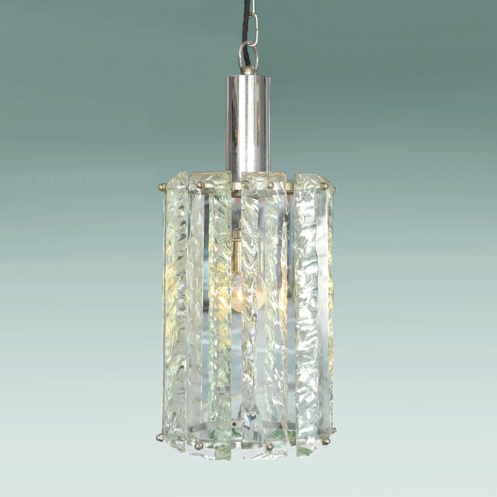 Fine Murano glass pendant of faceted drops in very pale eau de nil forming a circular shade supported by its original chrome frame.