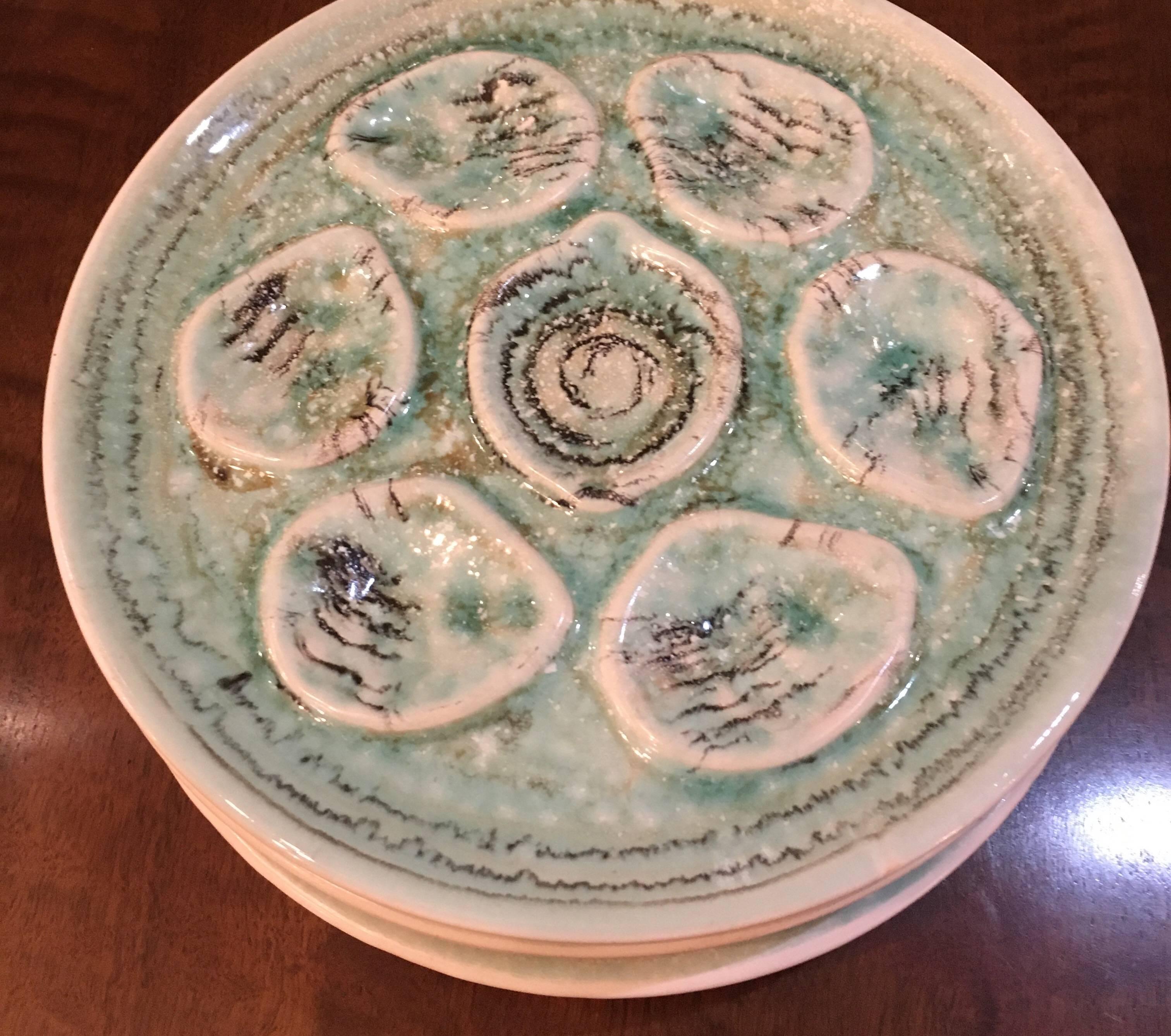 Lovely set of 6 midcentury hand glazed oyster plates.