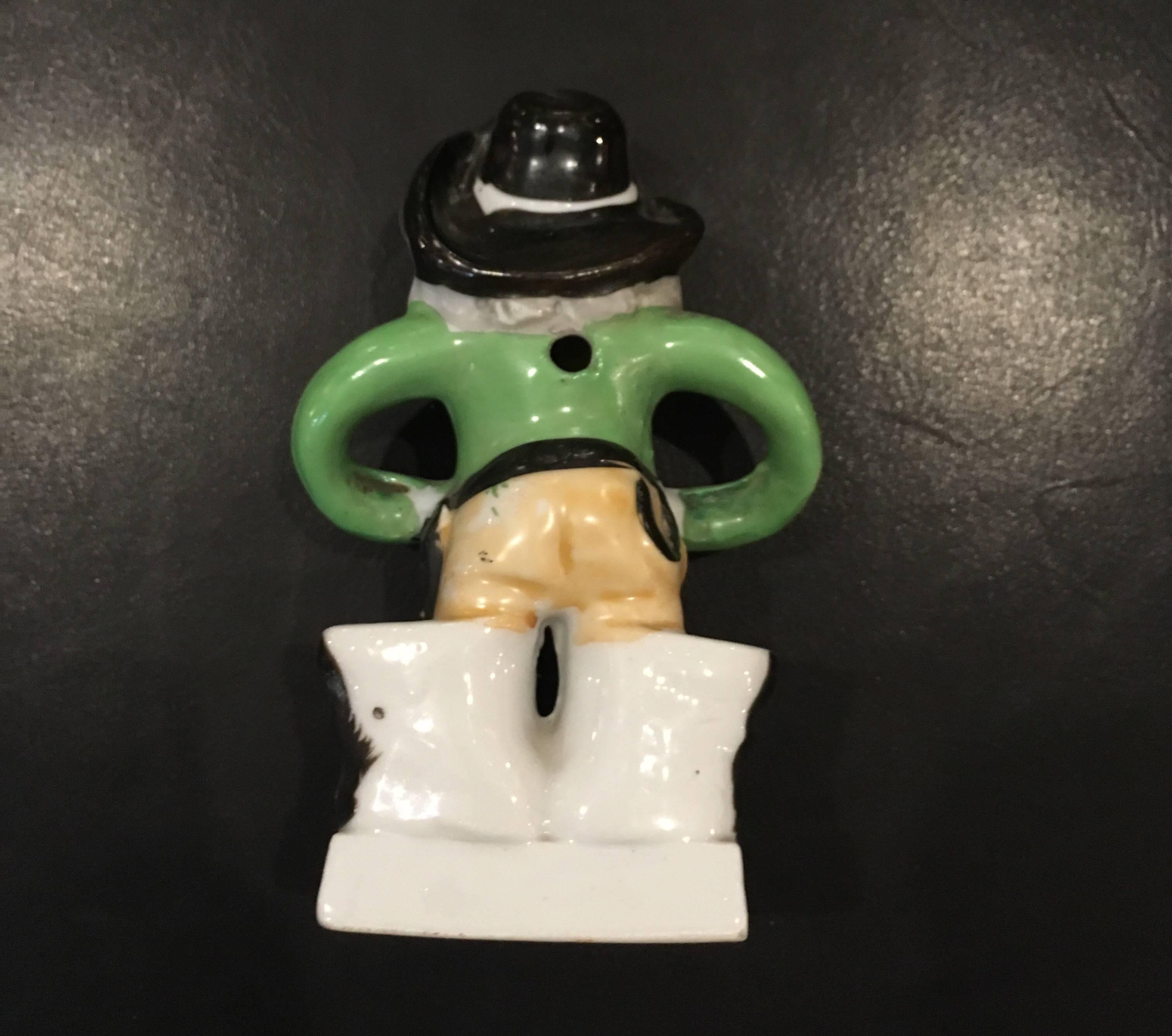 Nostalgic and very fun toothbrush holder made in Japan for good little boys and girls.
Holds two small toothbrushes, and has a spot for a small tube of toothpaste to lay at the pirates feet.