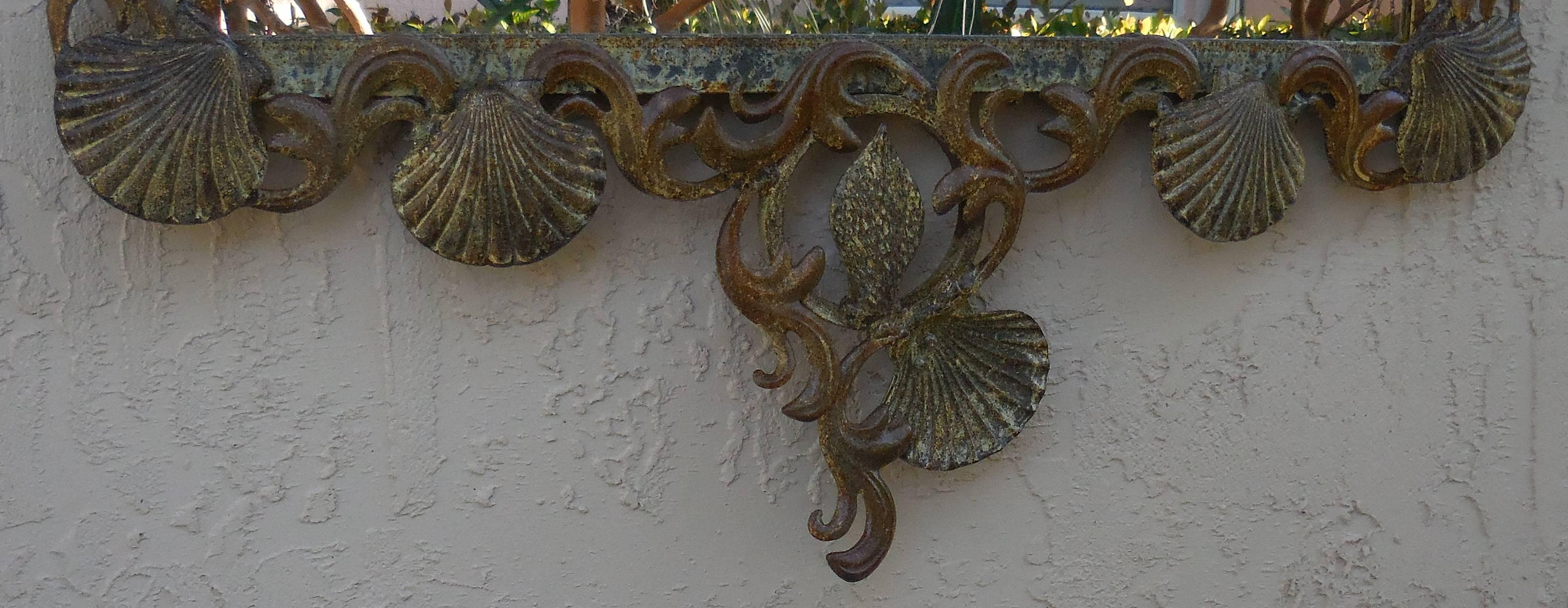 Fantastic mirror made of forged and cast iron, all decorated with shell and sea star motifs.
Treated for rust.
Great patina.