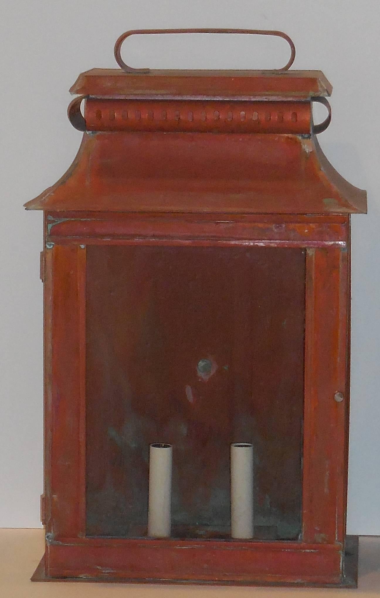 Pair of large and impressive wall lantern made of copper, with two 60/watt light on each lantern.
Made in the US.
UL approved, suitable for wet location.
Wired and ready to light.