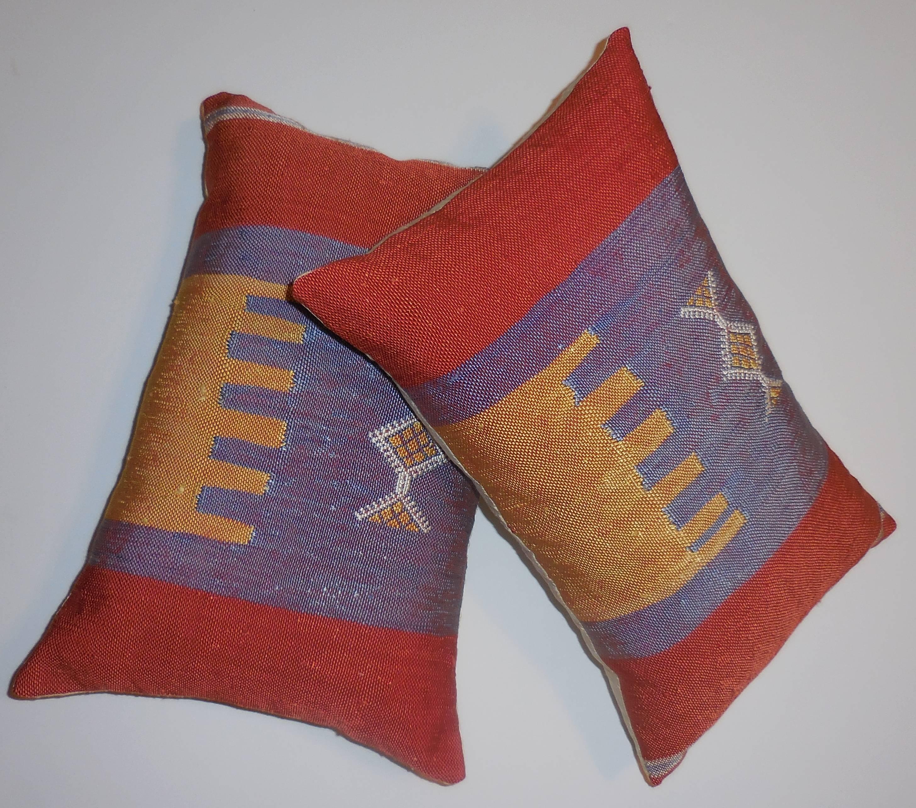 Colorful abstract pillows made from flat-weave Moroccan textile. Back of pillows are made of silk.