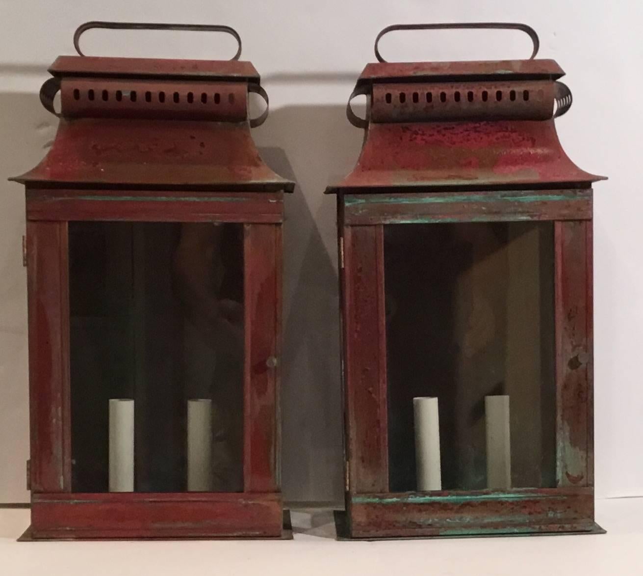 Pair of architectural wall lantern made of copper, with two 60watt lights
electrified and ready to light. Made to US code UL approved.