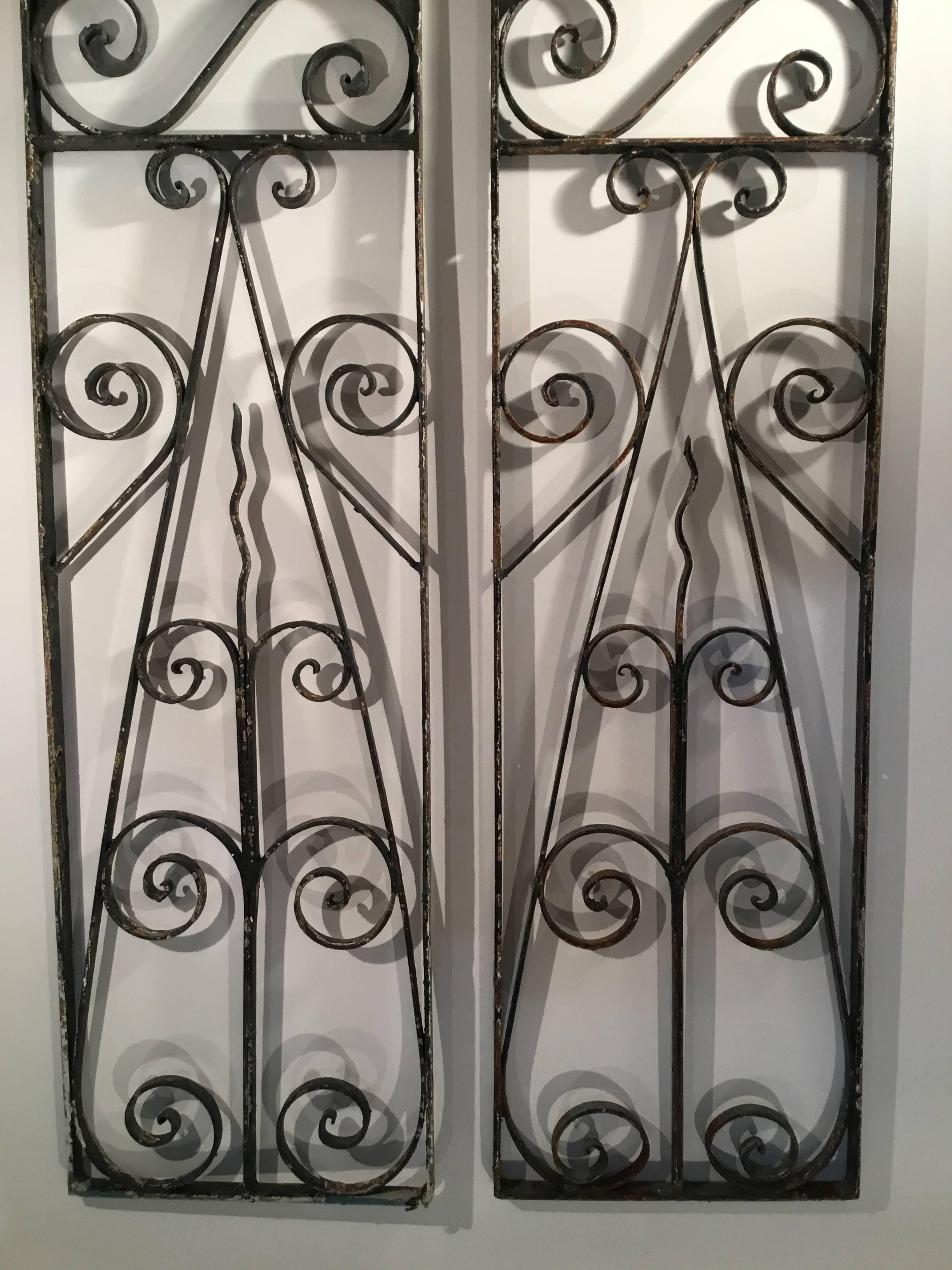 Pair of Large Architectural Iron Wall Hanging In Excellent Condition In Delray Beach, FL