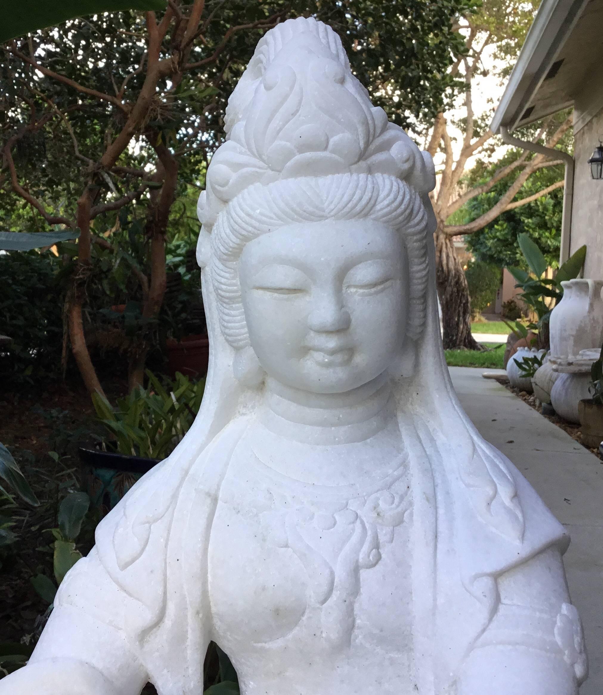 Beautiful hand-carved Chinese Hunan Buddha, made of white marble with some grey vain of marble.
The face is beautiful with very soft expression, and she in sitting in a king of
Interesting position of meditation.
Great architectural piece for the