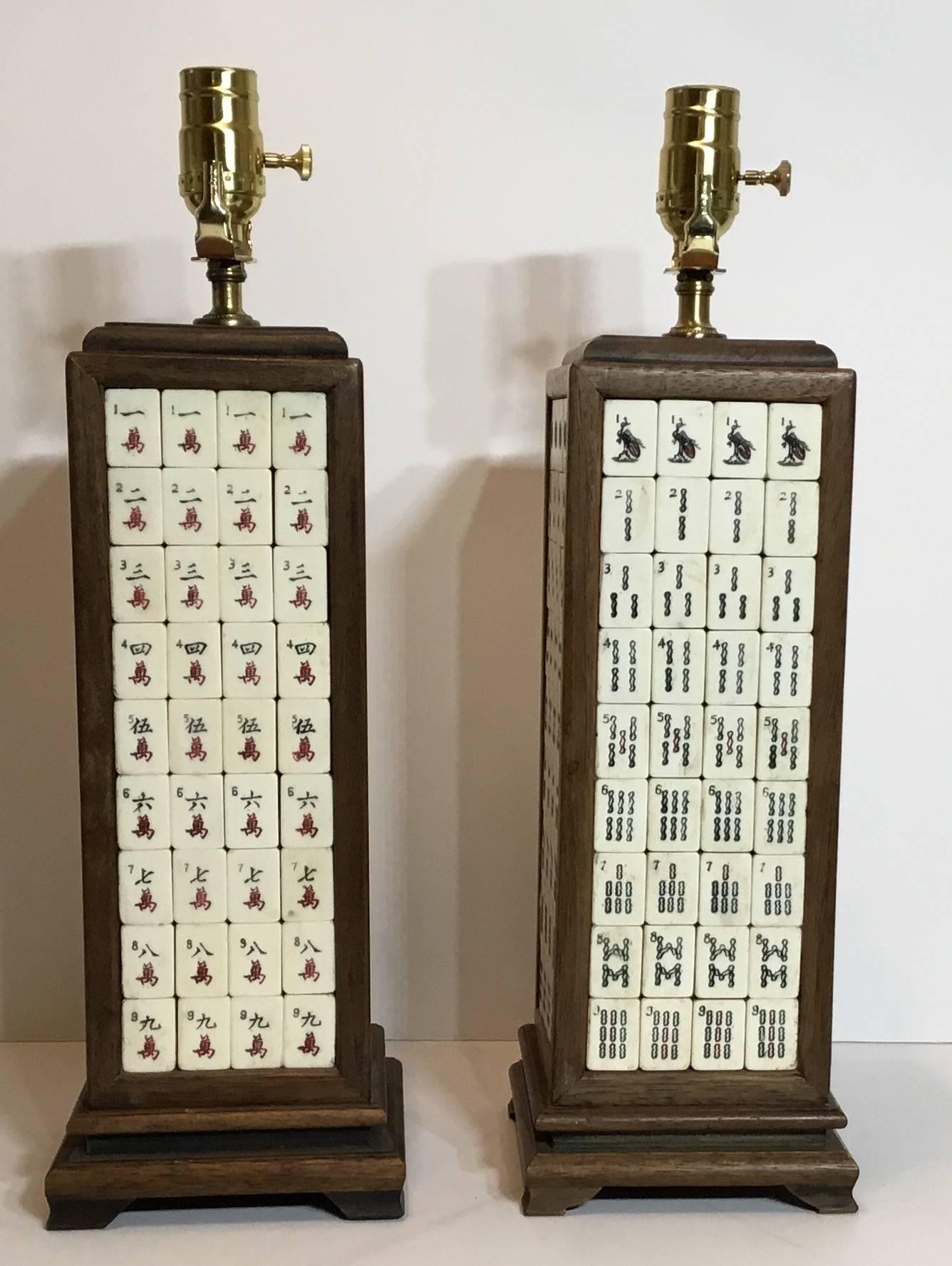 Funky pair of table lamps made of vintage tiles of Mahjong game, put together
In a very crafty wood frames, to become a one of a kind table lamp to all Mahjong game lovers, players.
Great conversation piece.