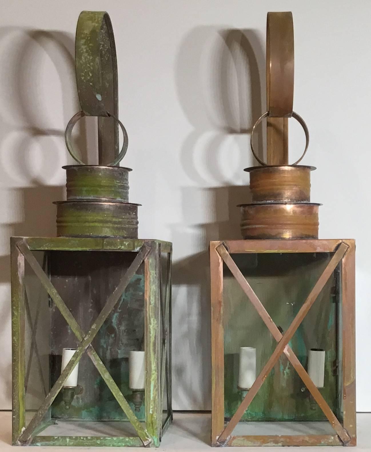 Pair of architectural wall copper lanterns made of copper, with two 60/watt
Lights, electrified and ready to light.
UL approved, up to US code.
Suitable for wet location.
 