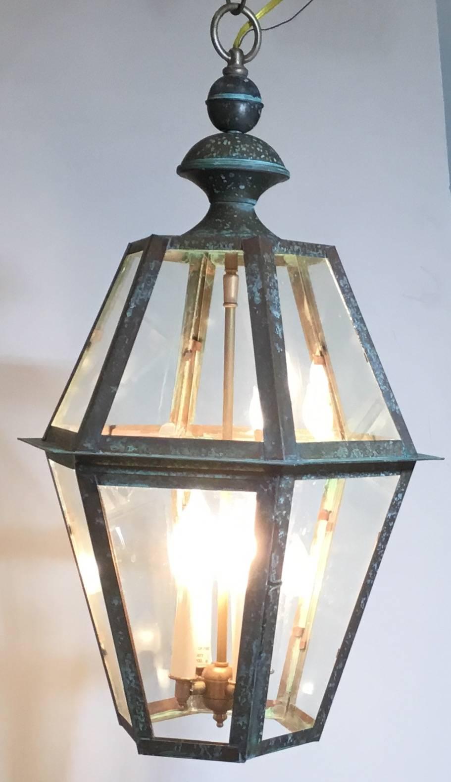 Architectural hanging copper lantern made of copper, with four 60/watt lights
Electrified and ready to light, great indoor or outdoor.
Up to US code, UL approved.
Copper canopy included.