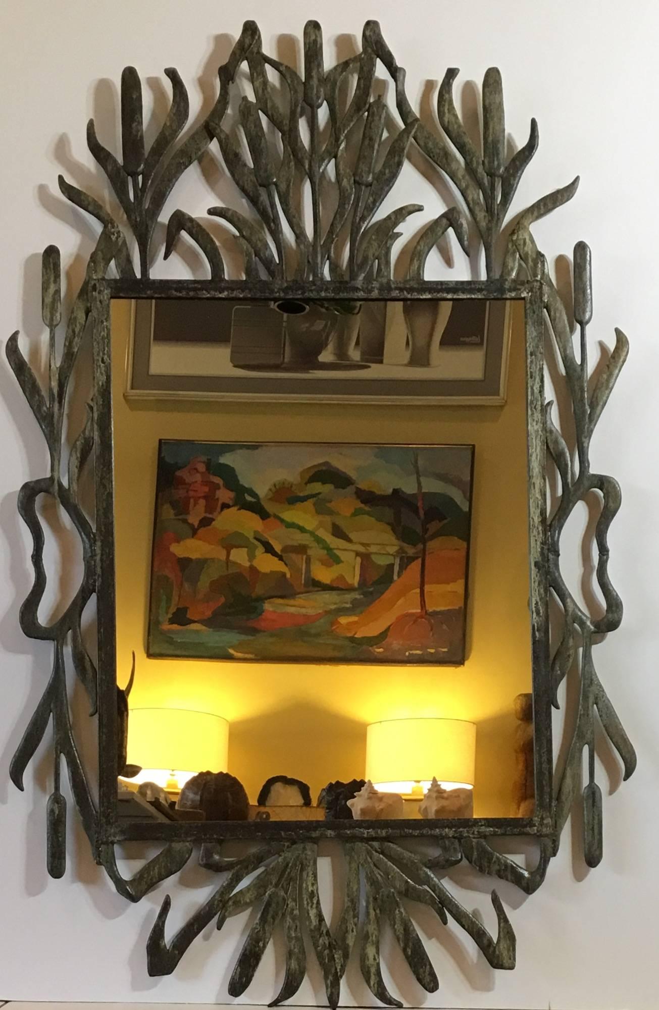 Fantastic decorative mirror made of cast iron, unusual cat tail motif with beautifullly enhance patina treated for rust, look very impressive.
Full size: 54".5 x 34"
Mirror size only 28".5 x 22".5 

One more available.