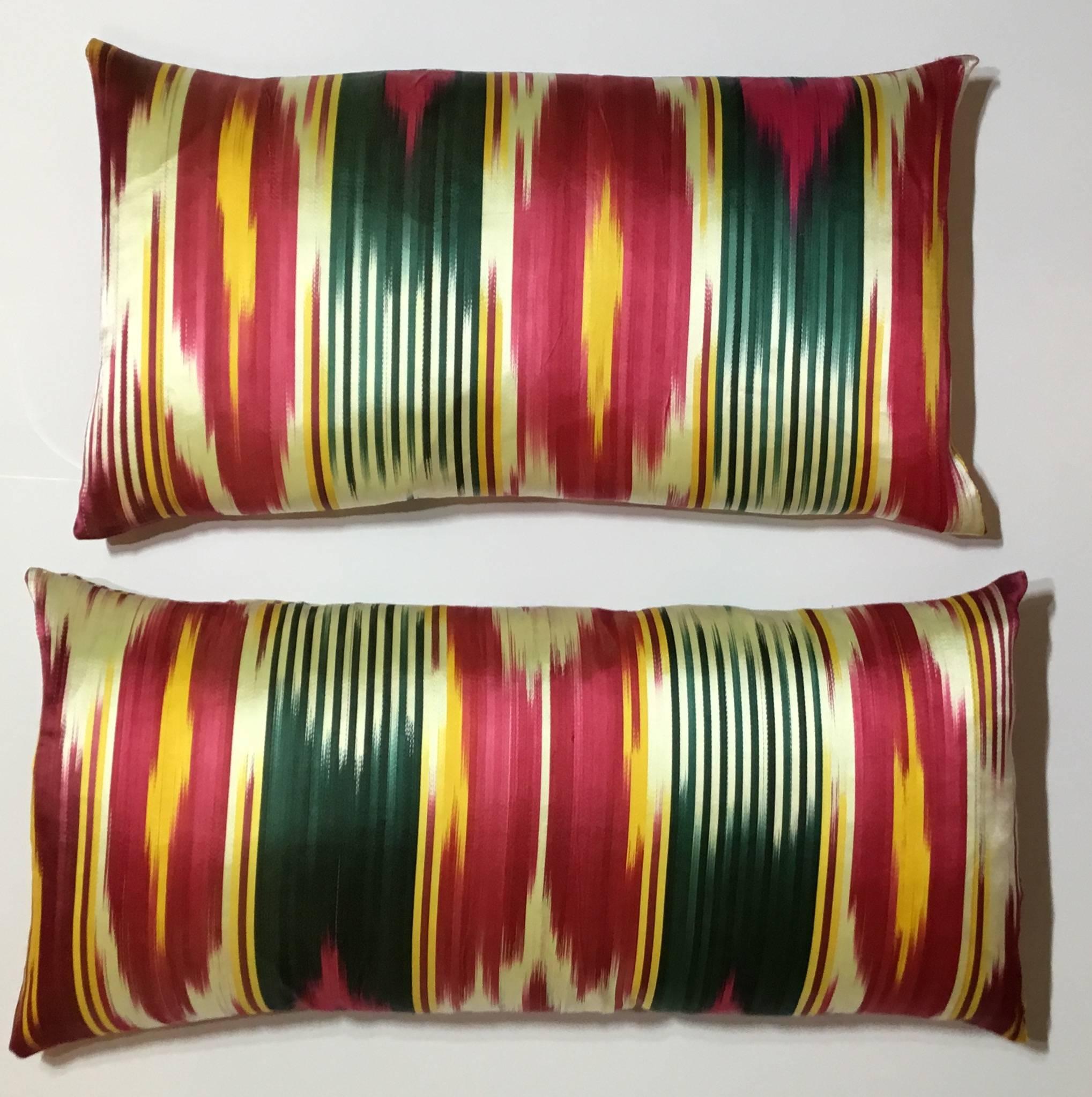 Beautiful pair of pillows made of original old silk Ikat from Uzbekistan, Ikat on both sides, soft silk with down and feather fresh inserts.
Sizes: 23" x 11". 20" x 11".