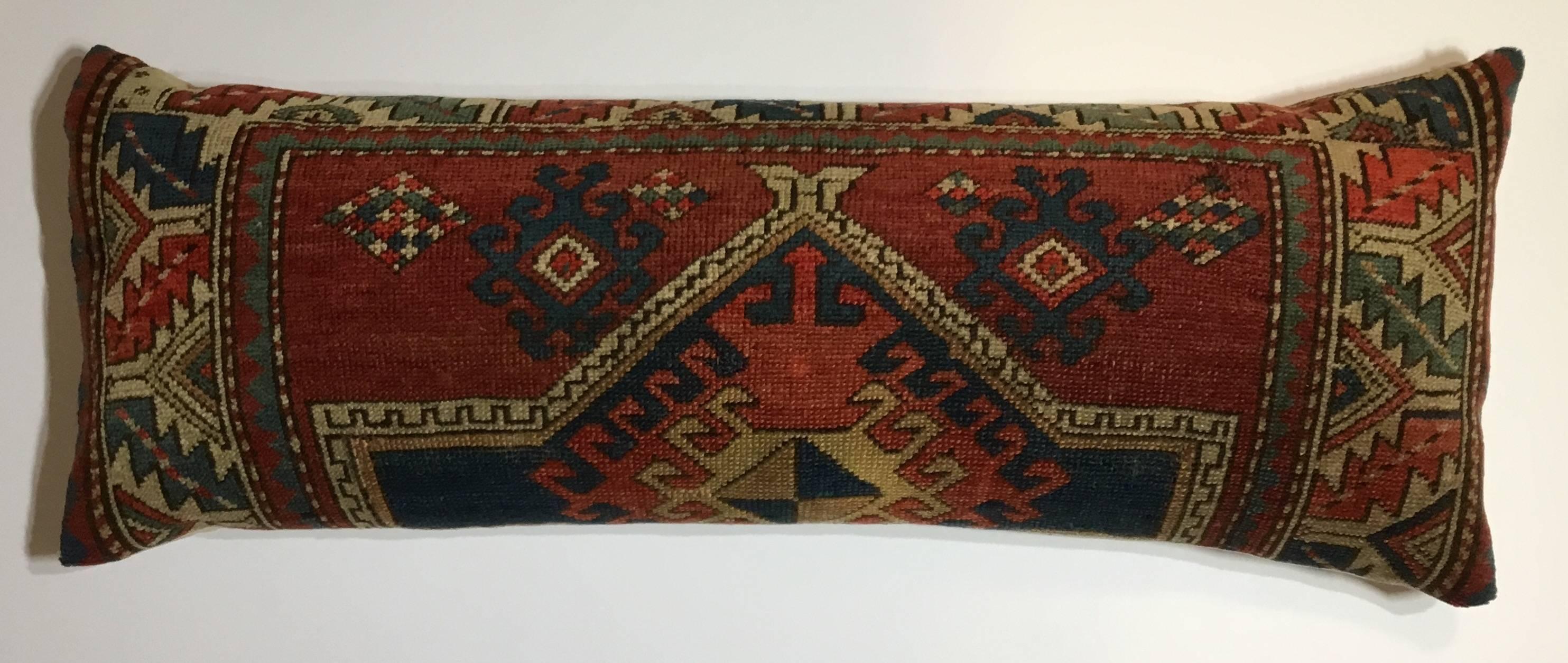 Beautiful pillow made of hand woven Caucasian rug fragment,fantastic colorful 
Geometric motifs.
Very minor professional repair,very clean with Frash insert,cotton backing .
Will enjoy for Many years to come .

