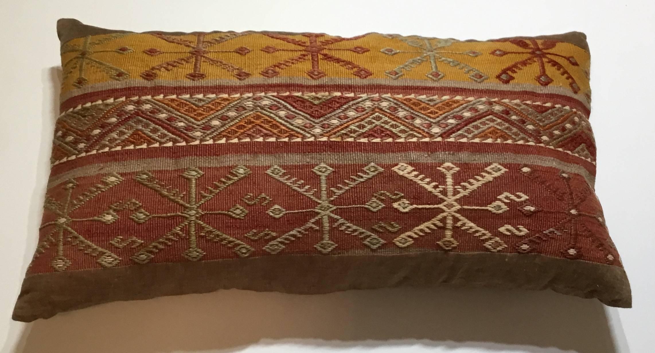 Beautiful pillow made of handwoven Kilim rug, interesting geometric motif on 
Soft muster and Solomon colors. Sides and backing made of fine linen, frash insert.