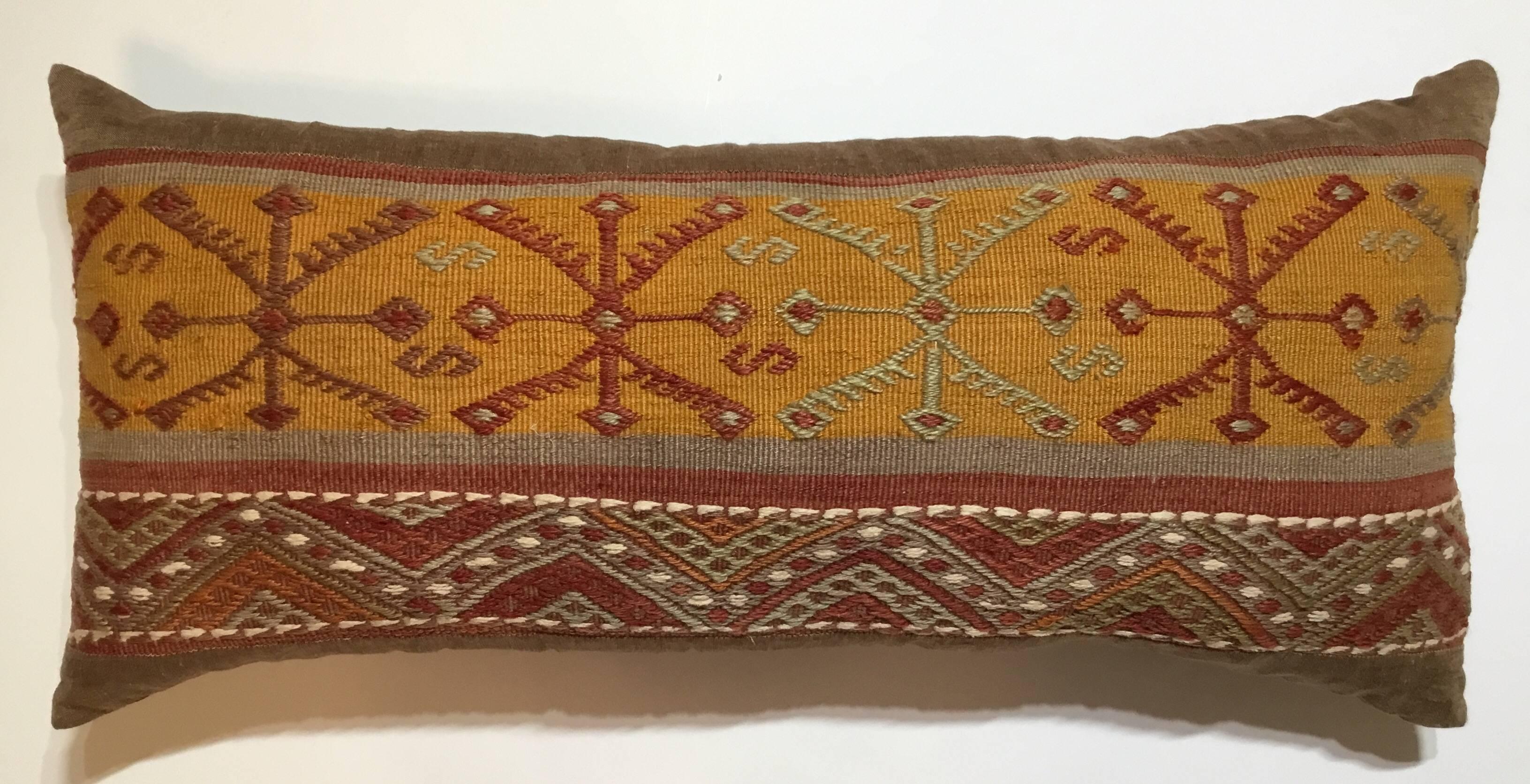 Beautiful pillow made of handwoven Kilim rug fragment, interesting geometric motif on soft muster and solomon colors.
Sides and backing made of fine linen, frash insert.