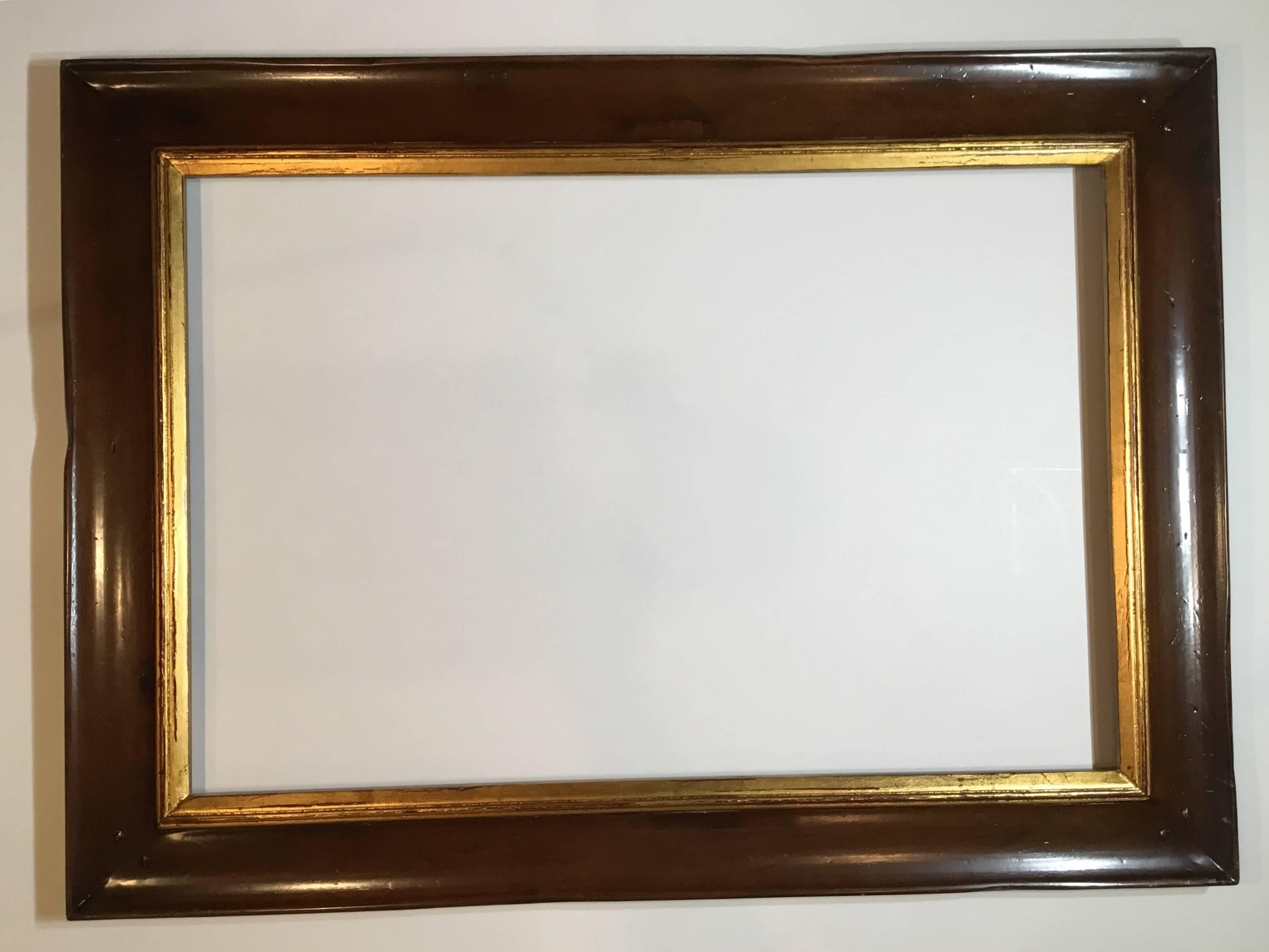 Beautiful wood frame with gold leaf trimming, would make great frame for important painting, or just convert it to a impressive wood mirror.
Glass mirror is not included.
Actual inside size for painting or mirror placement is: 24