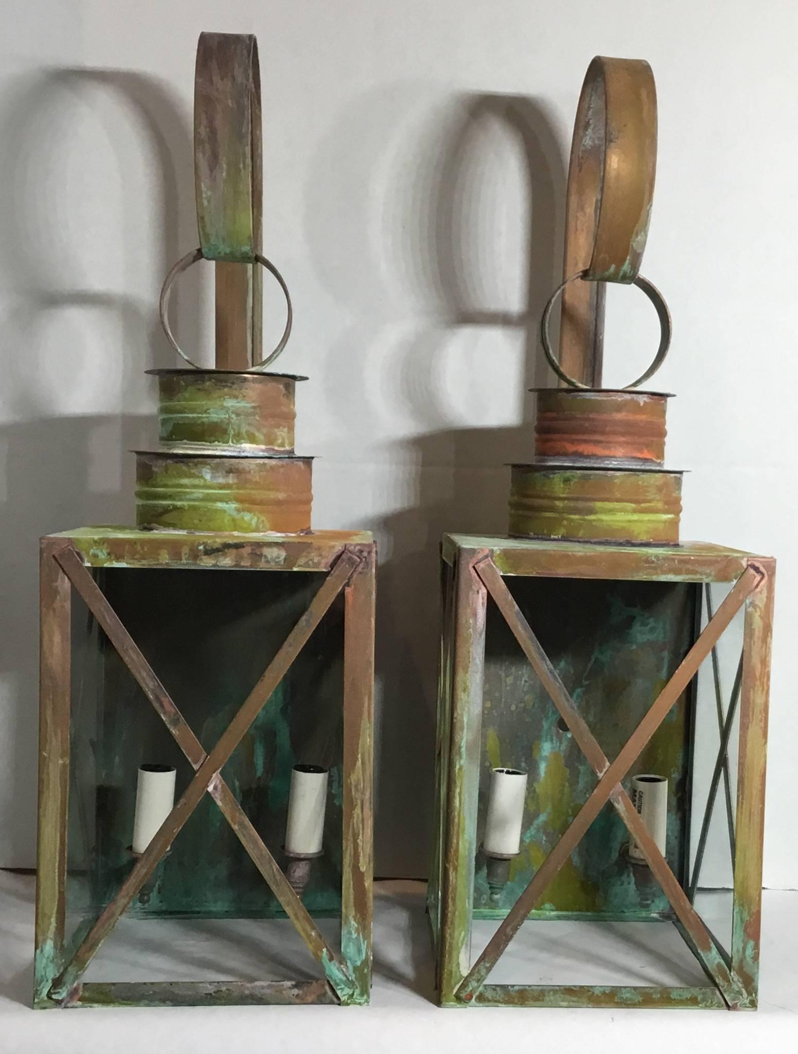 Pair of wall lantern made of copper, with two 60/watt lights each .suitable for wet locations UL approved, up to US code.
Fine quality, made in the USA.