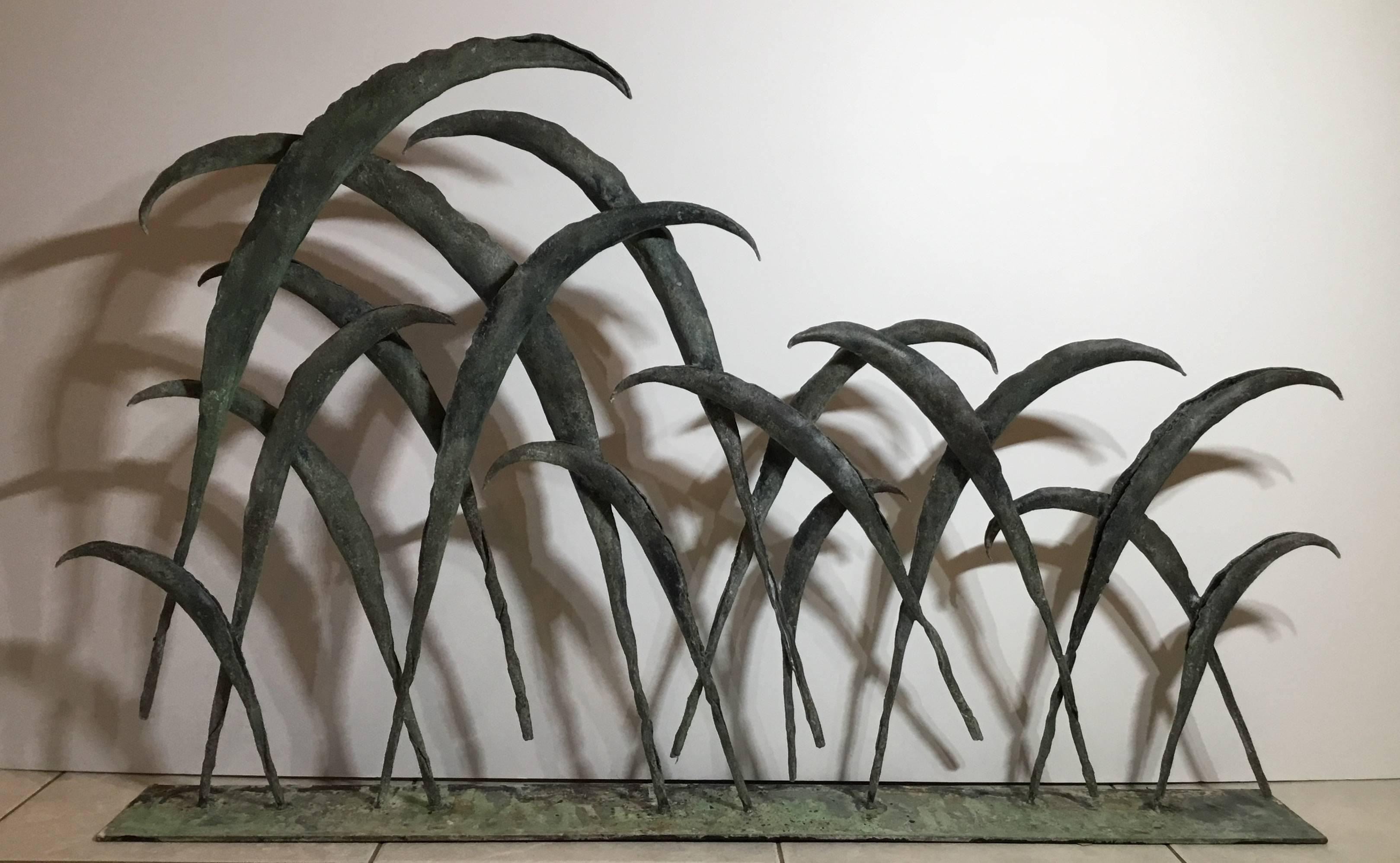 Elegant fireplace screen made of wrought Iron. Florida Everglades plants put together by the artist, probably Floridian.
All professionally mounted on a steel base.
Treated for rust and have a great patina.
Could use in both side as fireplace