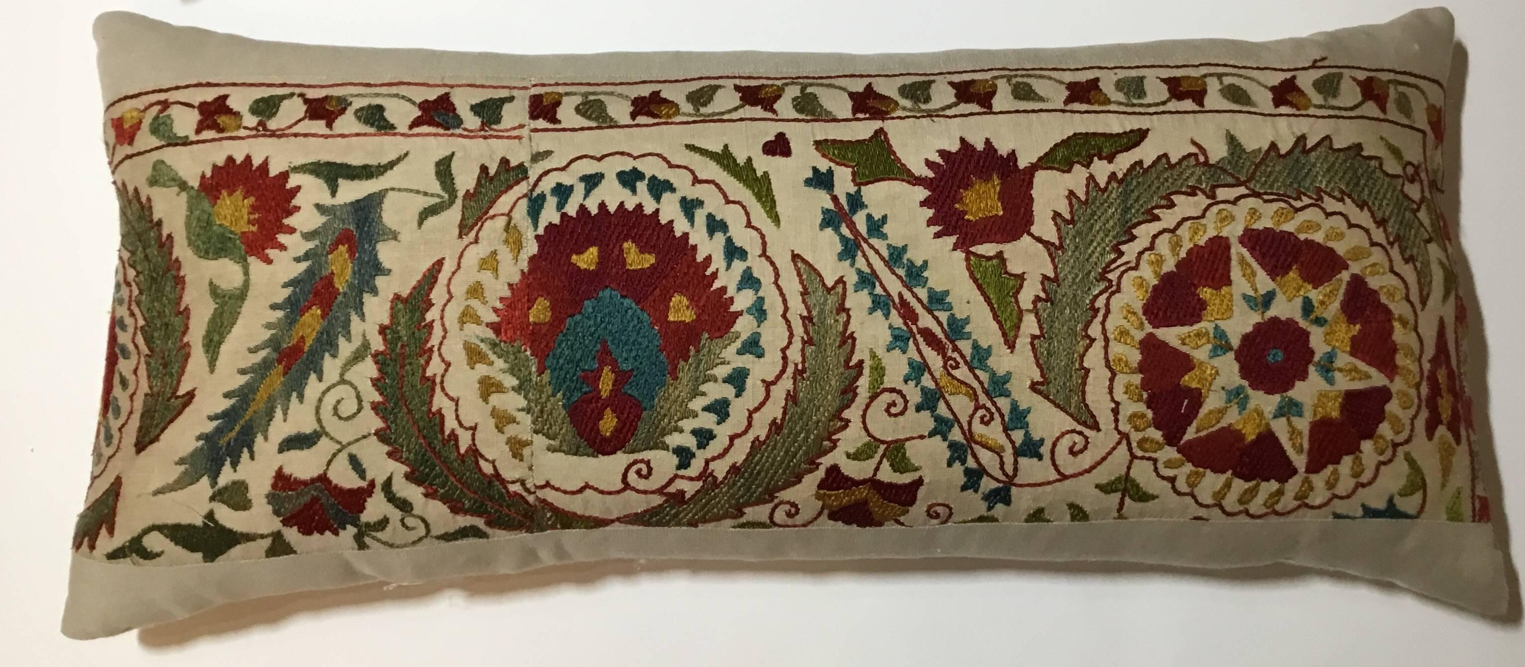 Beautiful pair of pillows made of hand embroidery silk on cream cotton background, colorful motif of vine and flowers, linen sides and background,
Frash inserts.