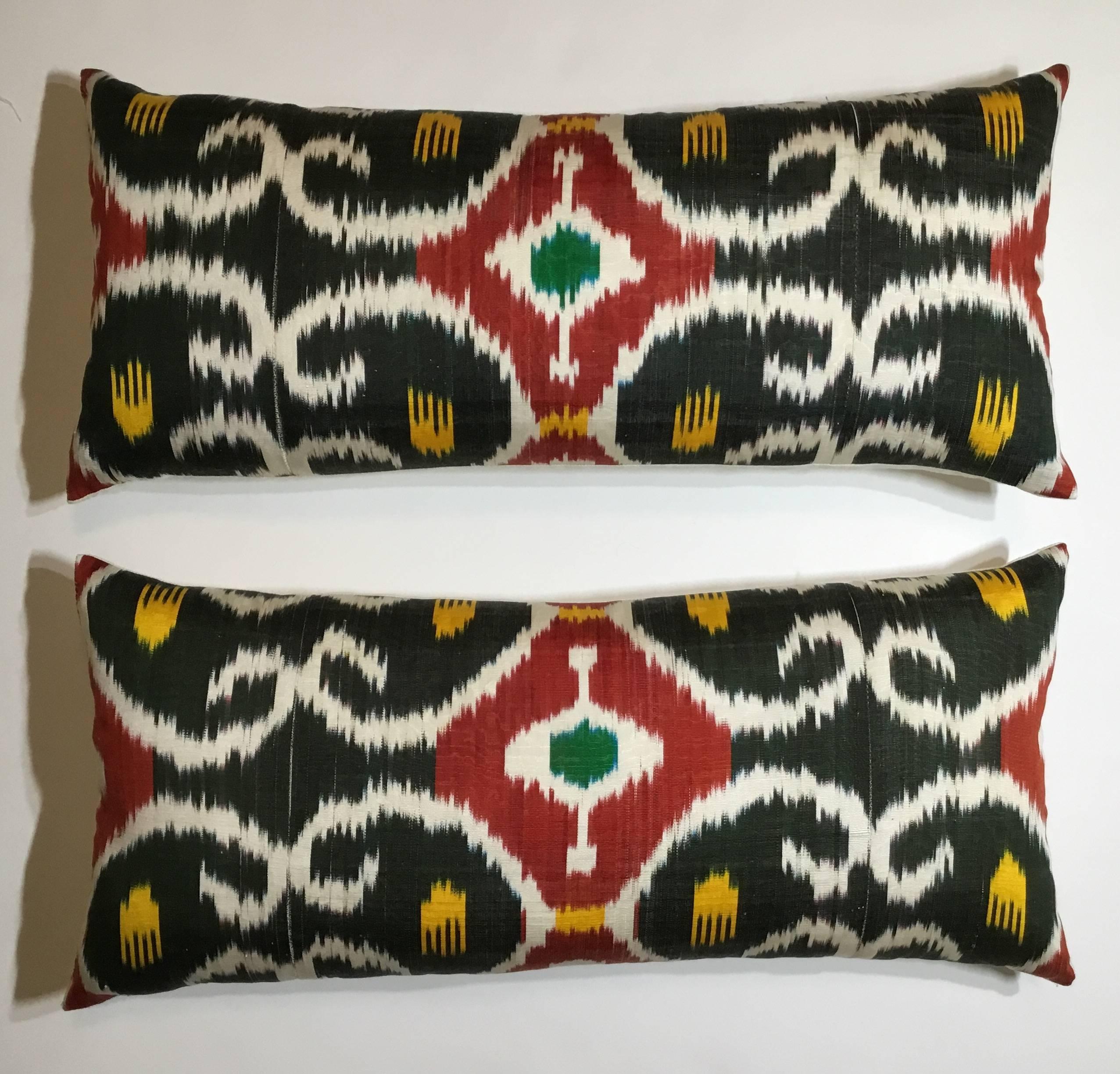 Beautiful pair of pillows made of colorful silk Ikat, Frash quality inserts, linen
backing.