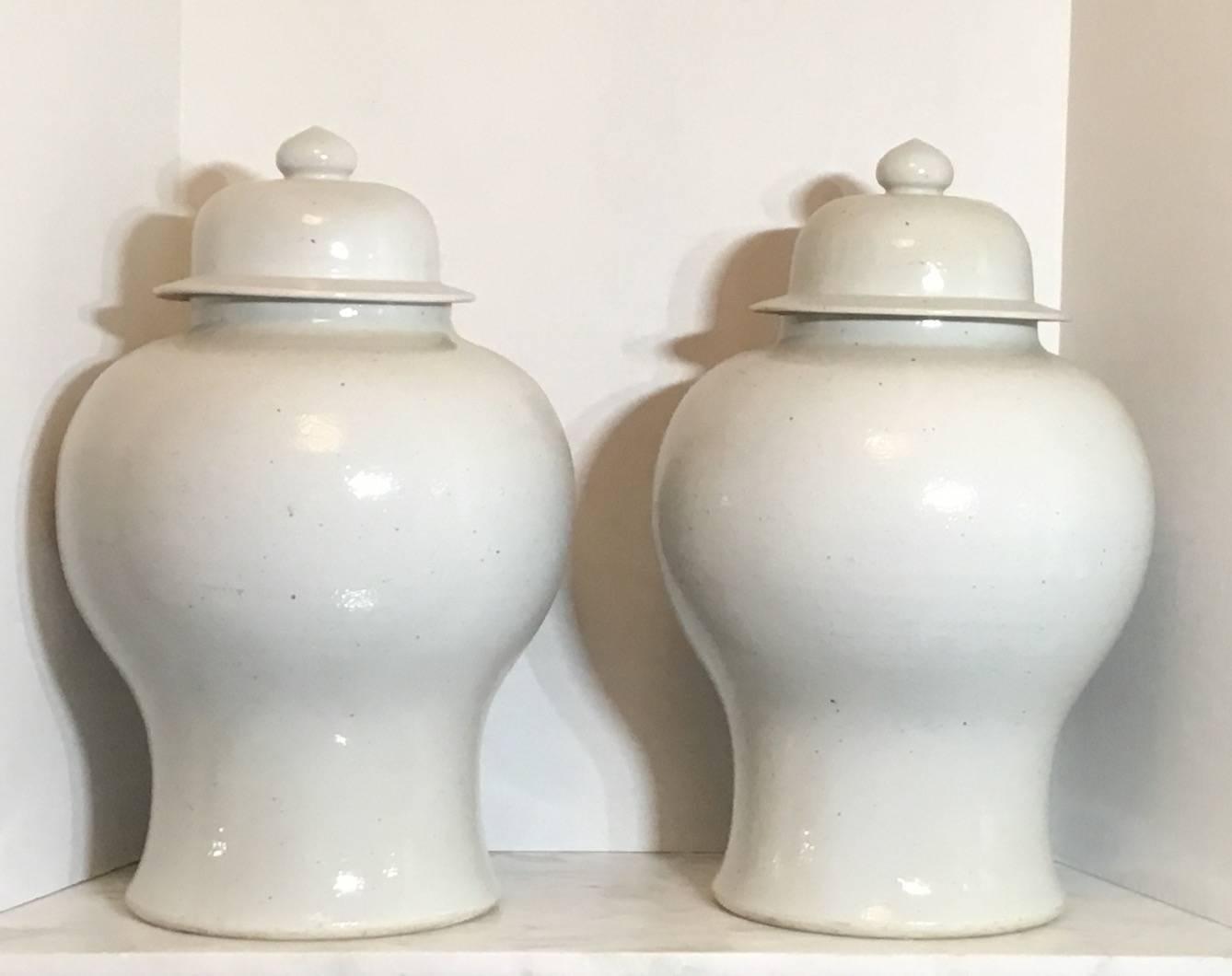 Elagent pair of decorative Chinese ceramic vases in gray-white color separate
Top included . Could decorate with or without top 
Size of opening 5