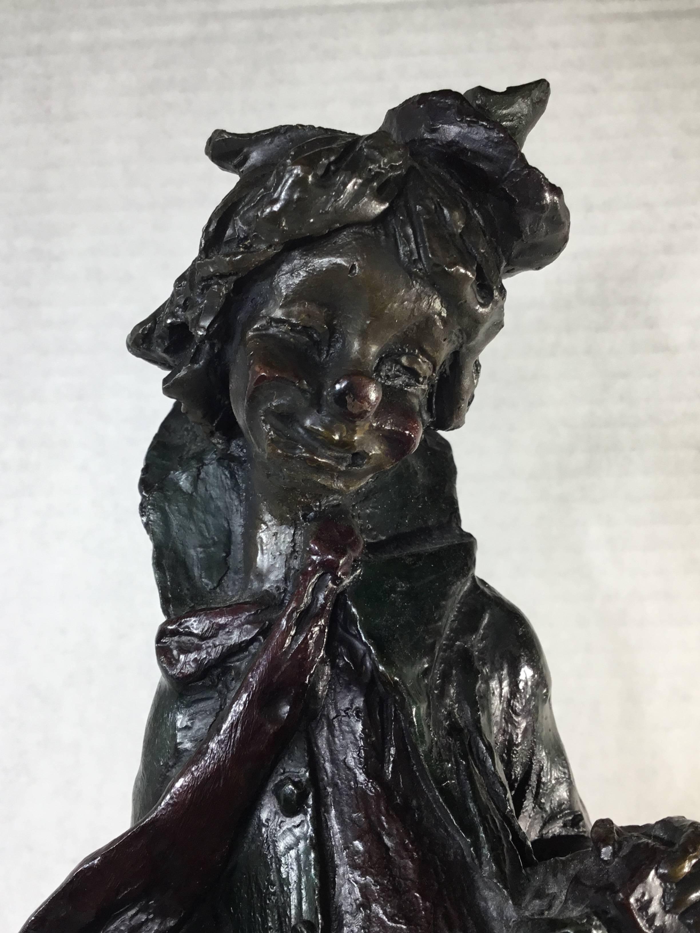 Fine work by A. Santini, intriguing bronze clown playing the accordion mounted on a beautiful marble base. Signature on the marble and on the bronze.
 