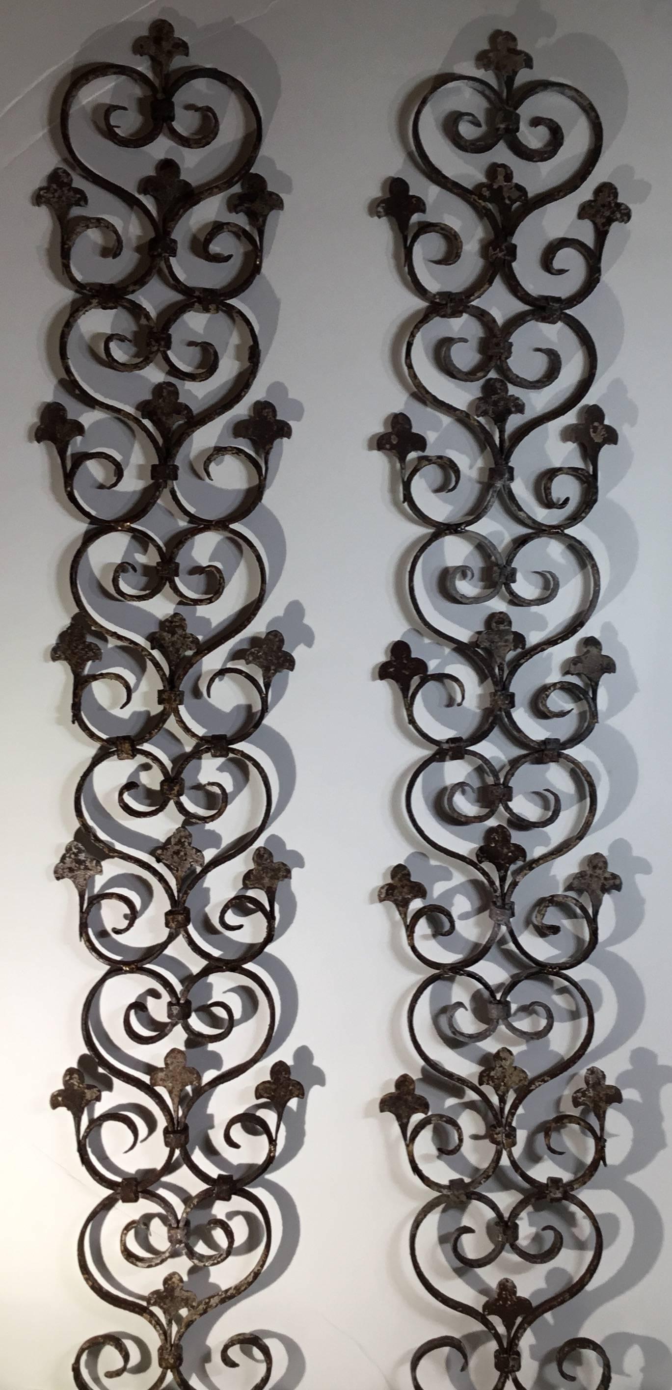 Elegant pair of wall hanging made of hand-forged and twisted iron pieces from the Mizner Era of
Palm beach Florida., put together to become very attractive wall decoration.
Could use horizontal or vertical.
