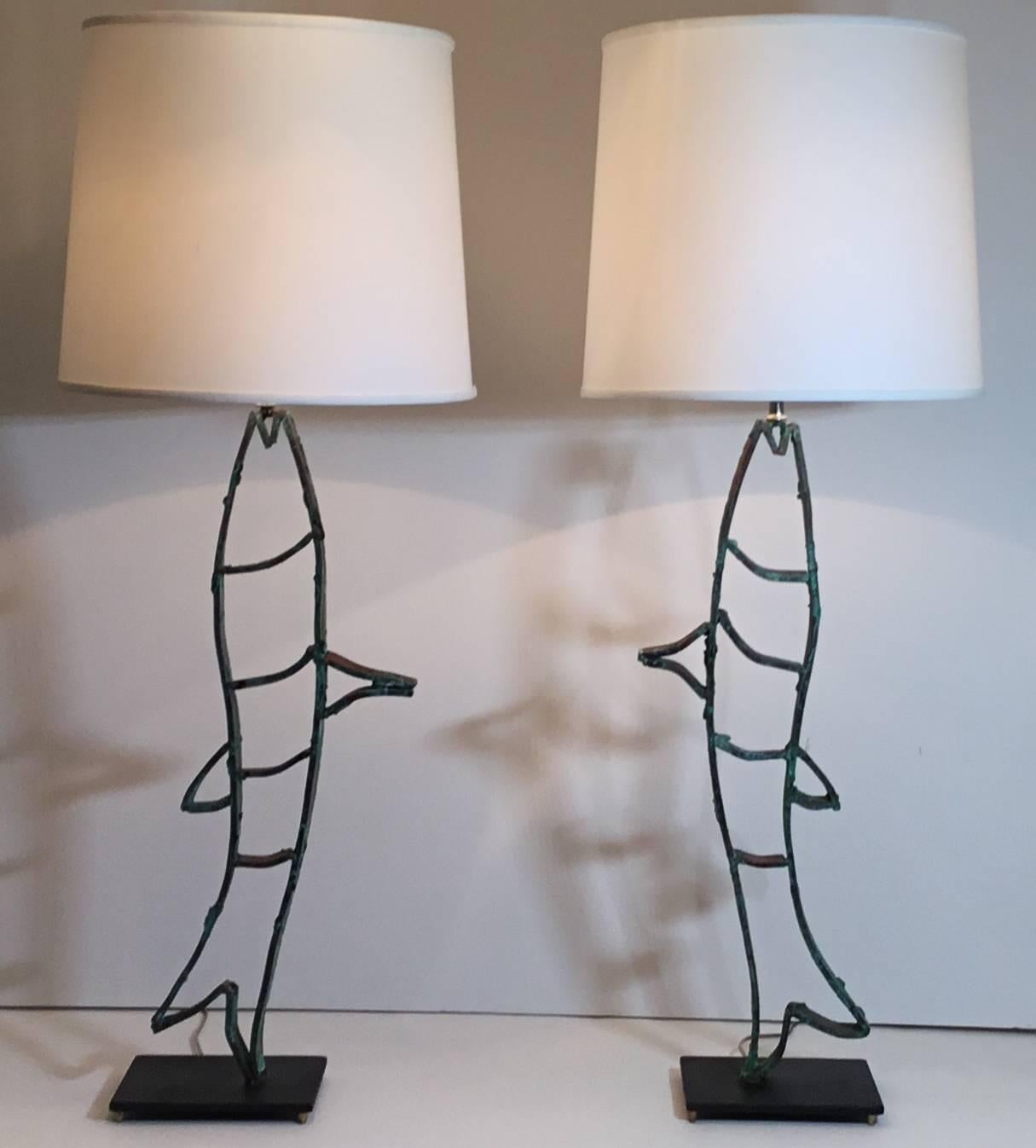 One of a kind pair of sculpture fish made of copper, beautifully weathered and oxidized .professionally mounted on steel base, wired and electrified to make fantastic pair of table lamps.
Shade are not included.
Hight with the shades 42”
Steel