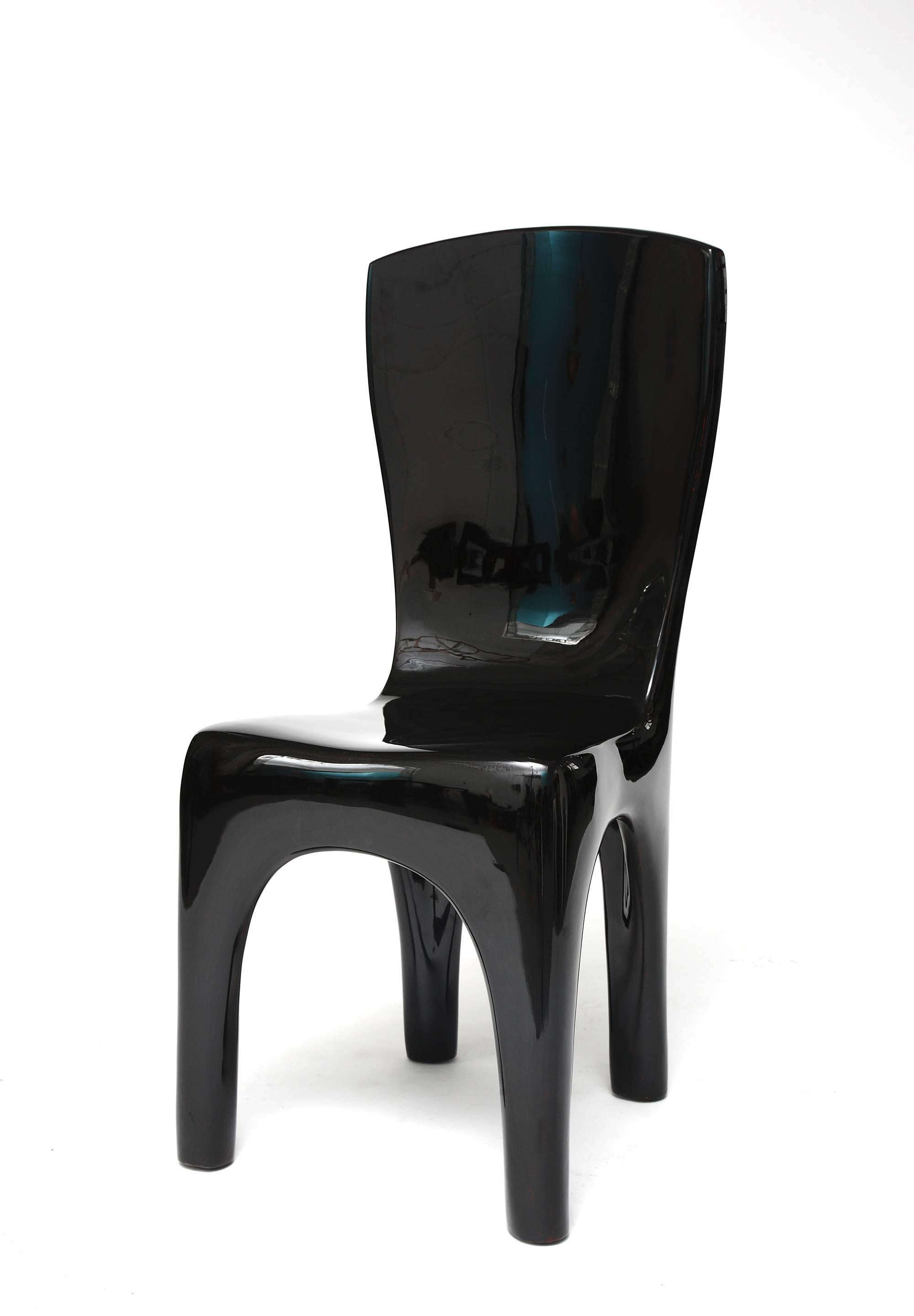 Set of sculpture dining chairs by Jacques Jarrige.

These high back chairs are finished in high end hand lacquer that reflect the surrounding space. It adds to the delicate effect of movement Jacques Jarrige's signature line provides.

Also