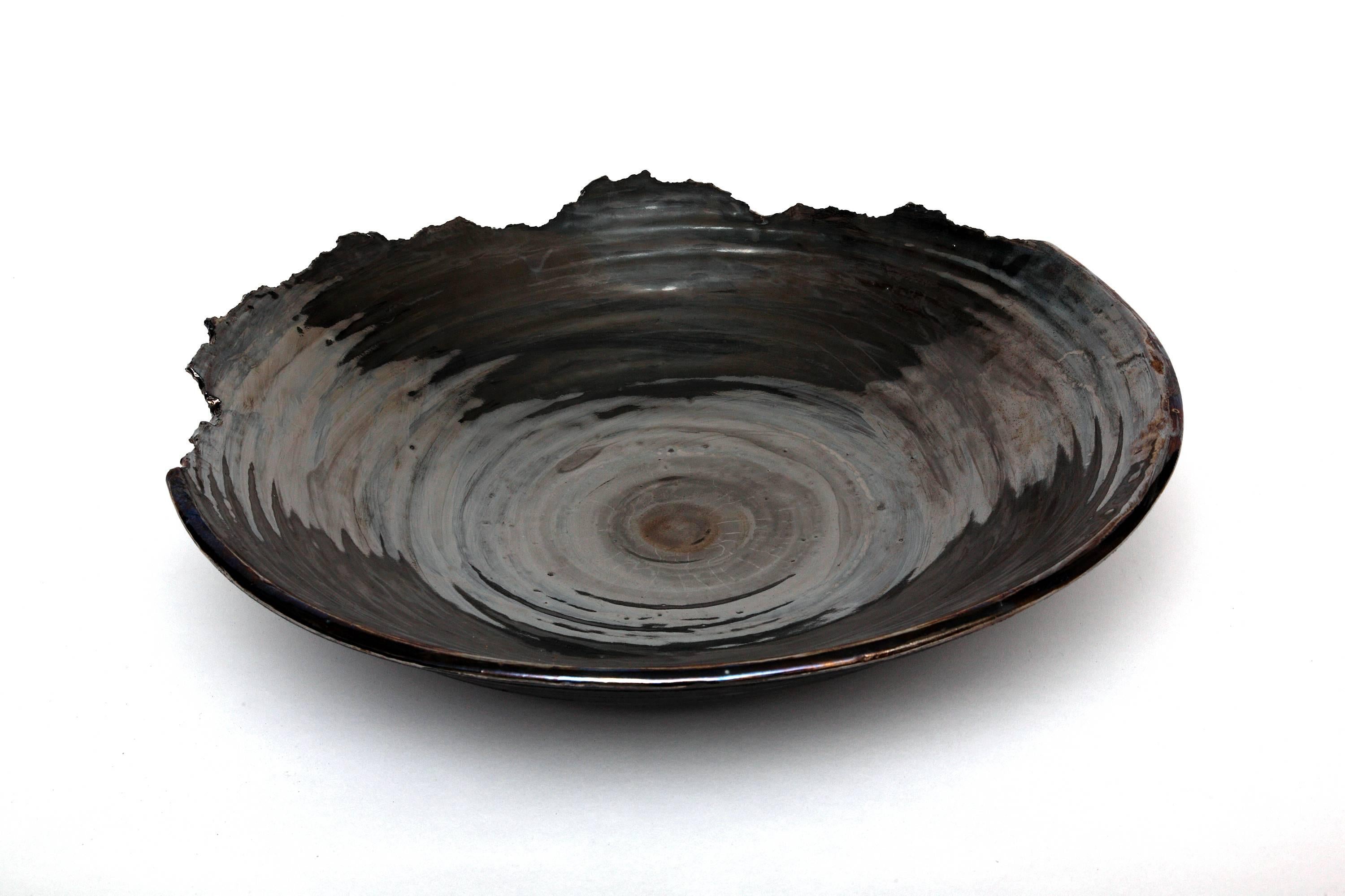 Stunning centerpiece by New Mexico ceramist artist Tatiana. She transforms clay into museum-quality stoneware thanks to her innovative use of carefully brushed precious metals—23-karat gold and platinum glaze—that give her work celestial