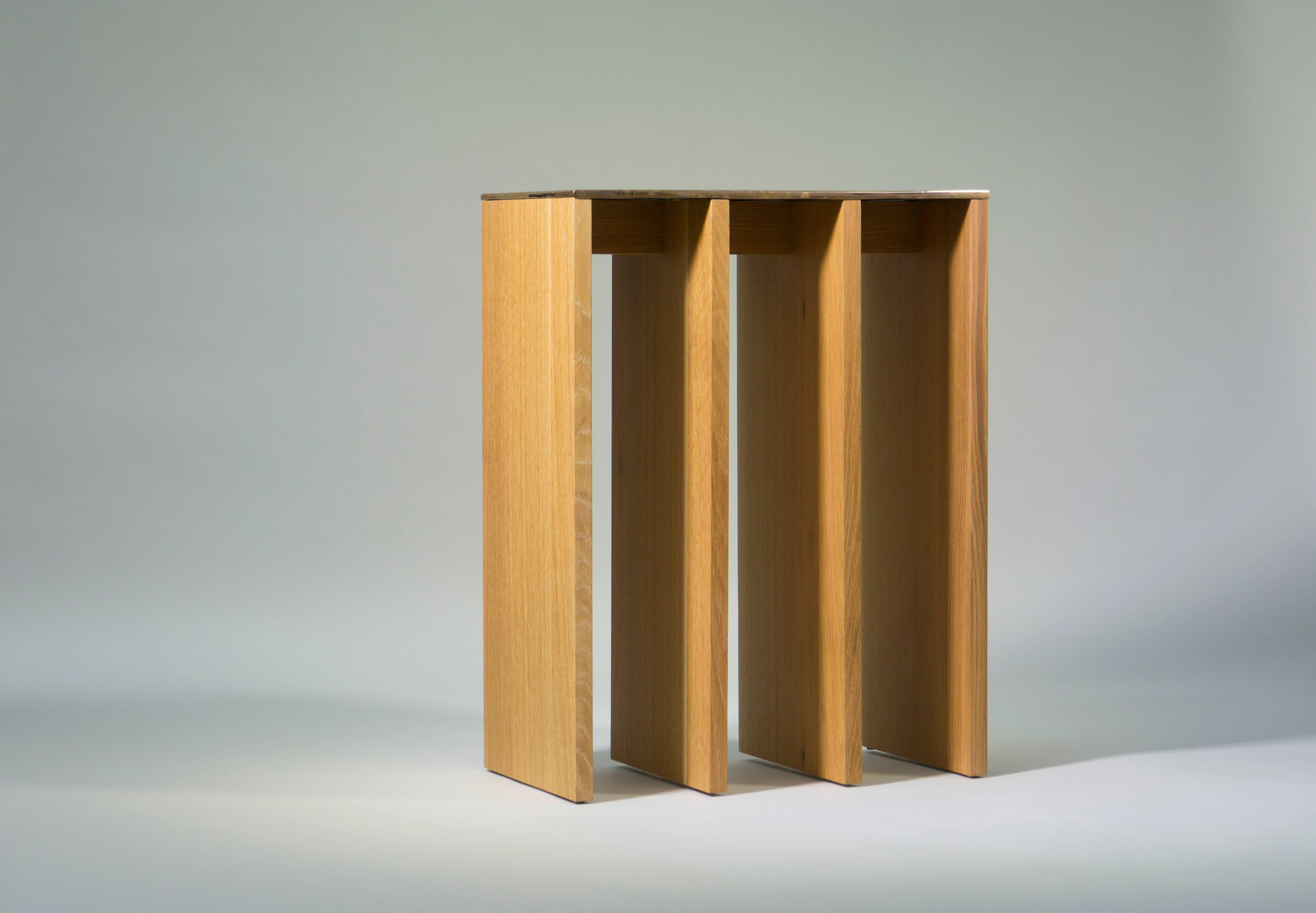 Console table in oak with polished bronze top by Tinatin Kilaberidze.
The geometric form of this console and apparent simplicity are emblematic of Tinatin's work. They make the piece elegant and timeless.