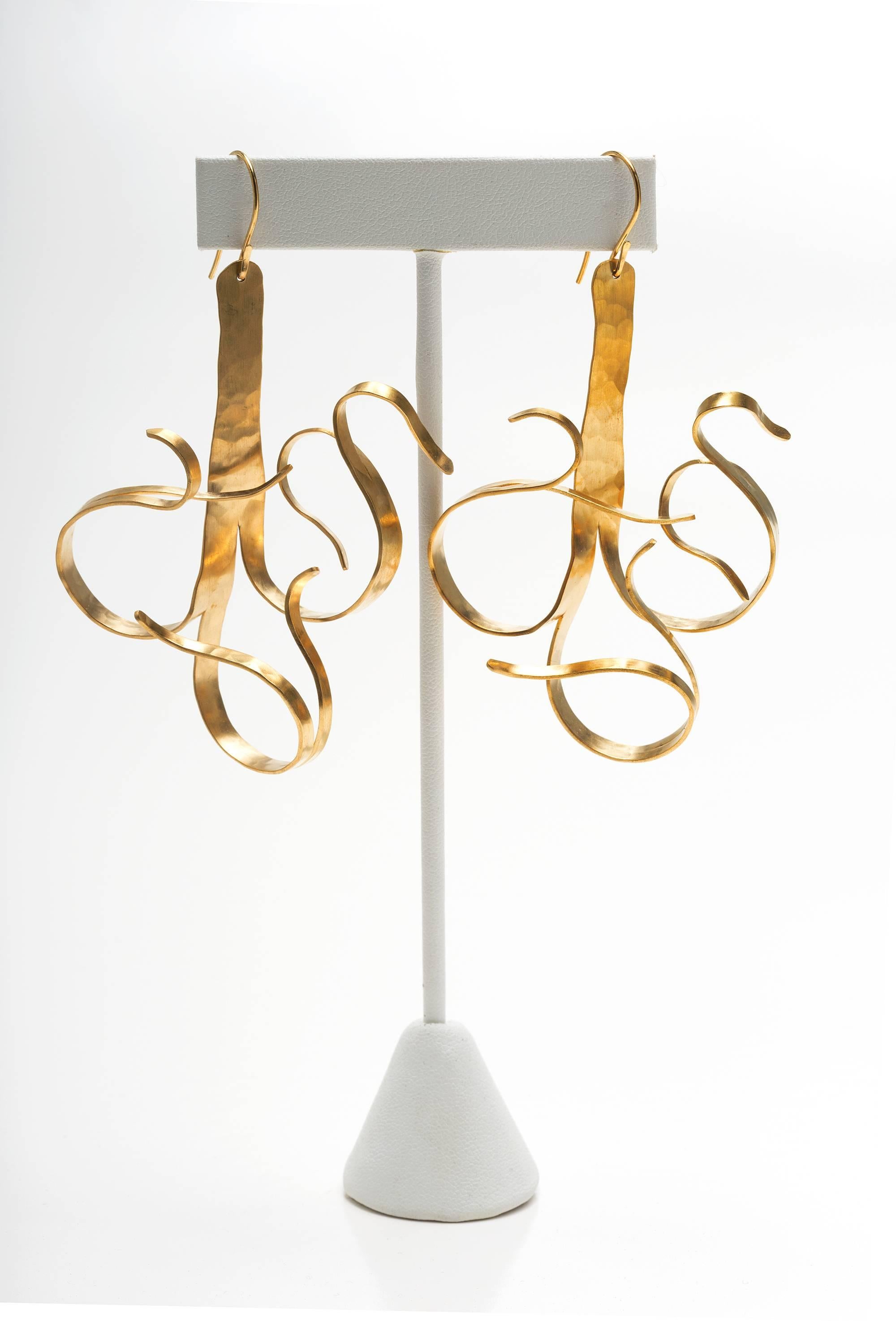 A pair of gold-plated earrings over brass by Jacques Jarrige inspired by his chandelier 