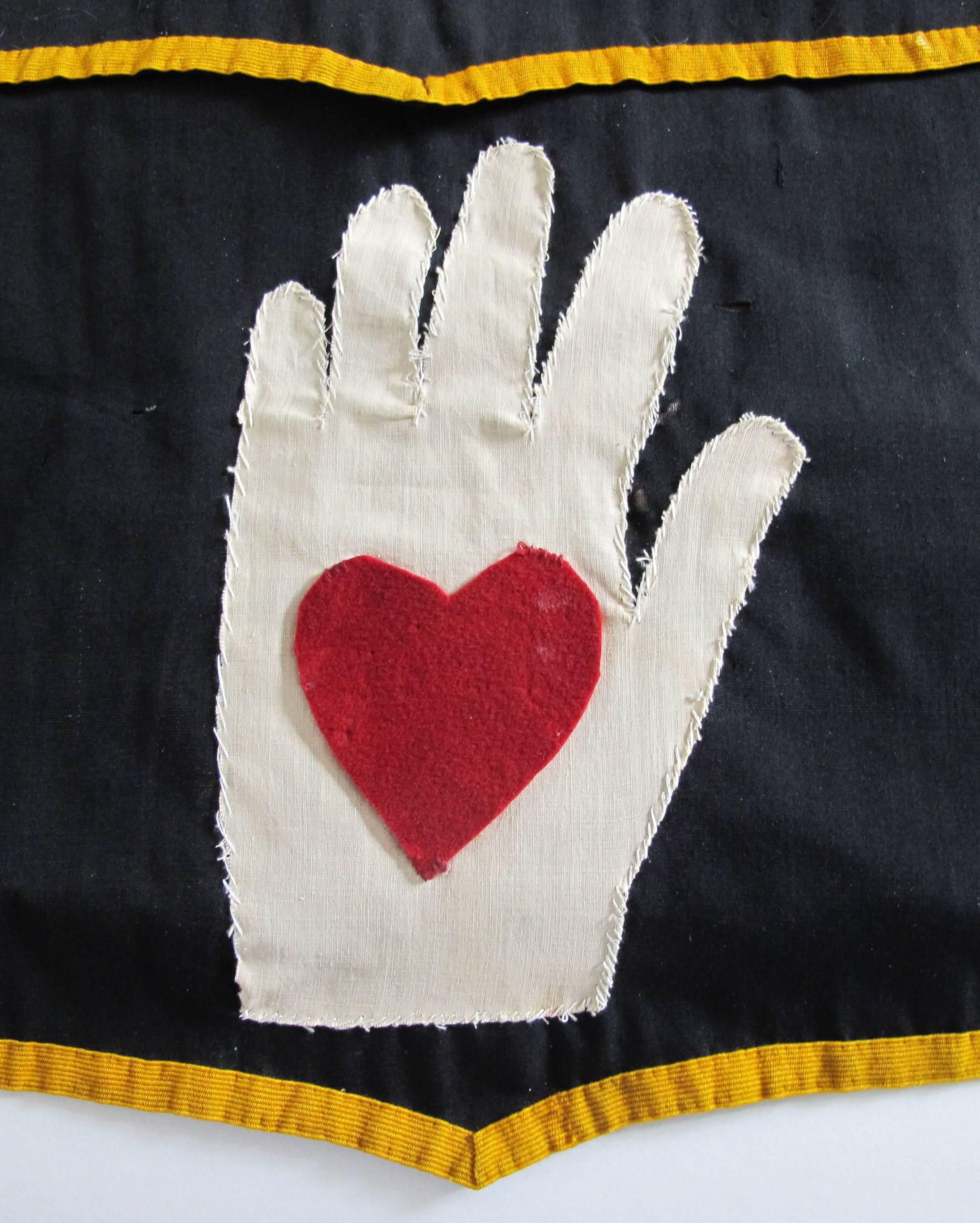 Rare fraternal lodge ceremonial apron from an Odd Fellows Lodge. The heart in hand was one of the primary symbols used to express charity and brotherly love.
This appears to be hand-cut and sewn rather than being made by one of the companies that