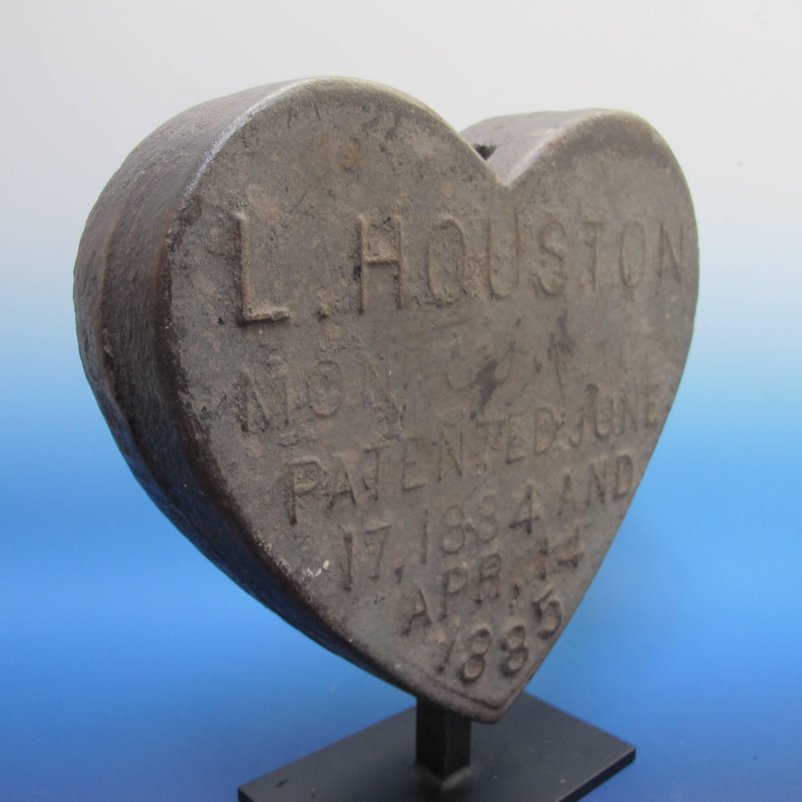 Rare windmill counter weight made to be fixed to the windmills seen on farms in the 19th century. He heart form is one of the most desirable forms and is rarely found.
One side of the heart has the name of the maker and the patent date of