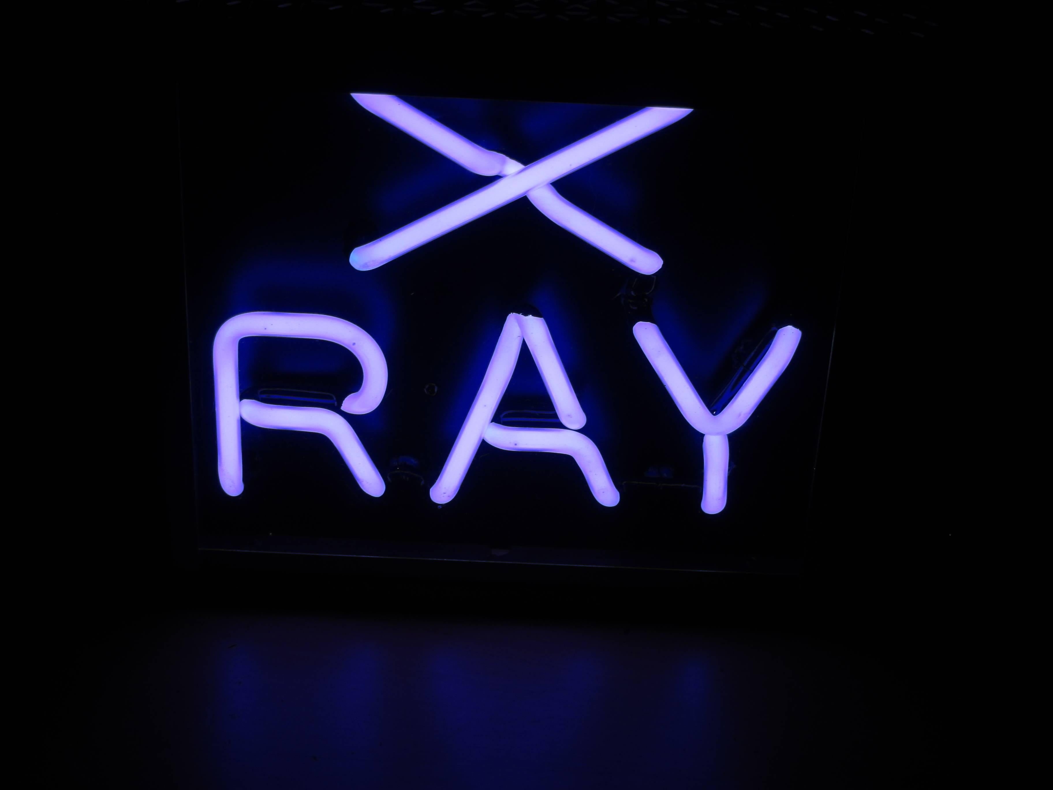 Machine Age X-Ray Neon Sign in Metal Case